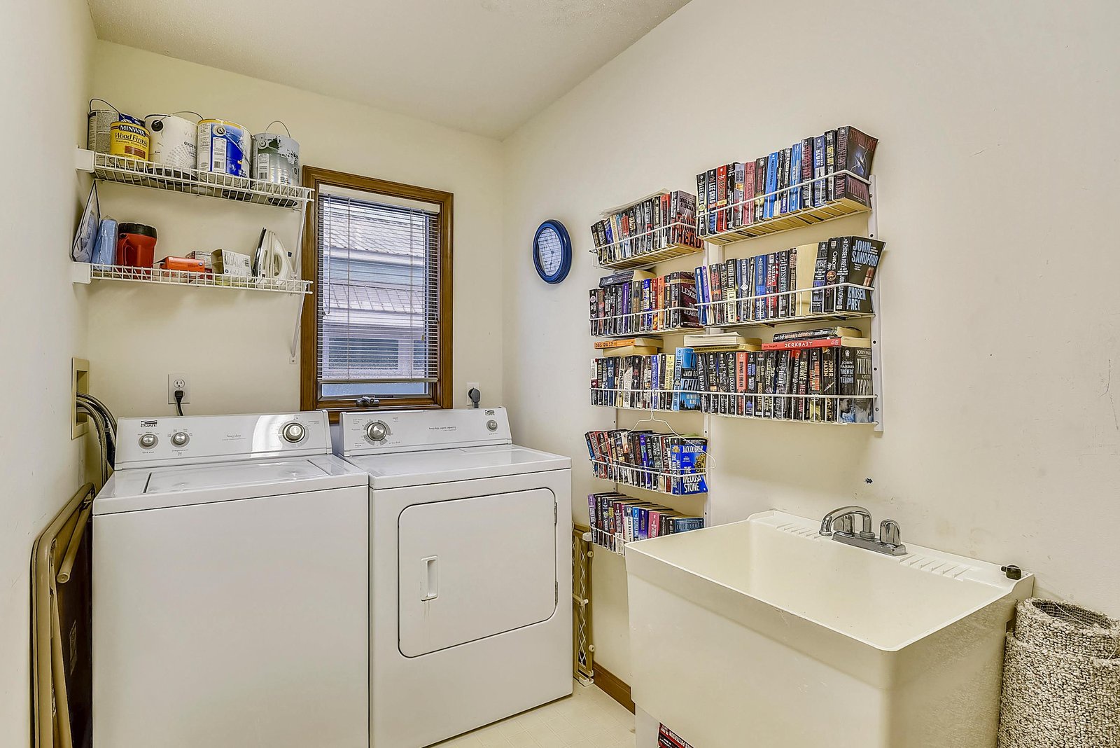 Keep your wardrobe fresh in this convenient laundry space, complete with a full-size washer and dryer for your comfort.