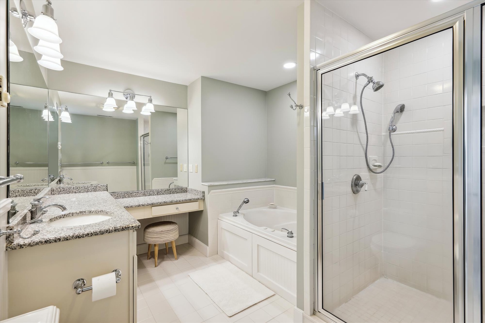 Step into your private spa-like bathroom with a dual-vanity, soaking tub, and walk-in shower. Bright and spacious, it's designed for ultimate relaxation after your adventures.
