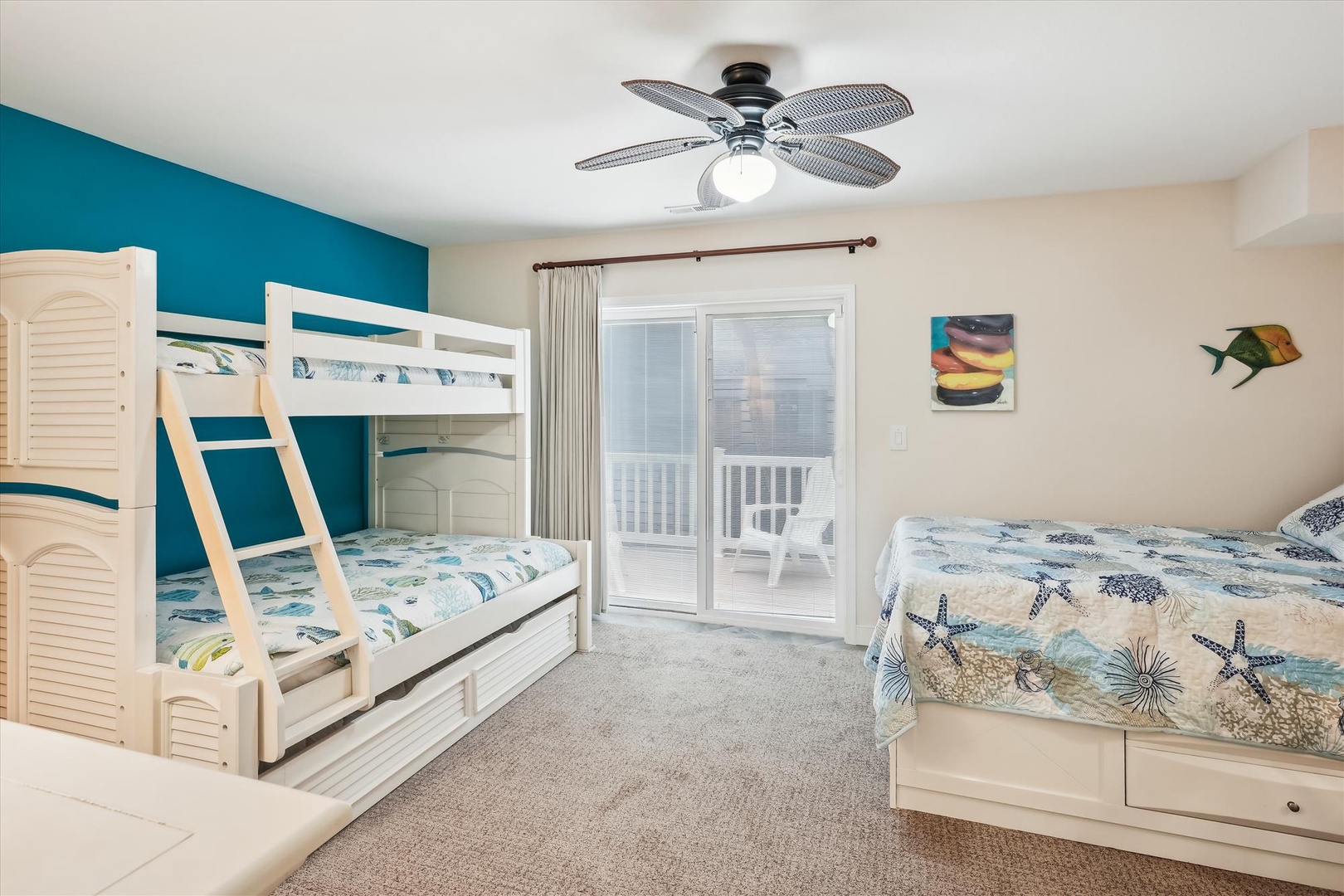 Drift off to sleep under a ceiling fan as ocean breezes float through your balcony door. Coastal decor and comfy beds create your perfect beach getaway retreat.