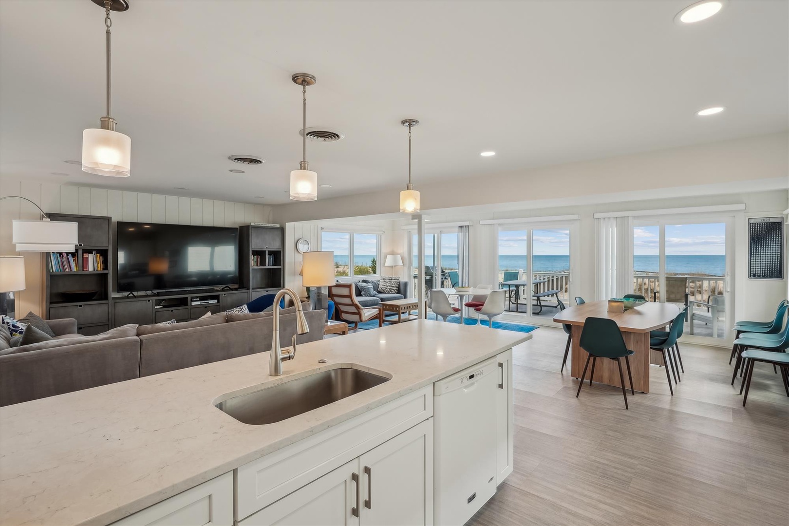 Your oceanfront retreat awaits with an open-concept living space where stunning sea views greet you from every angle, perfect for coastal relaxation and memorable gatherings.