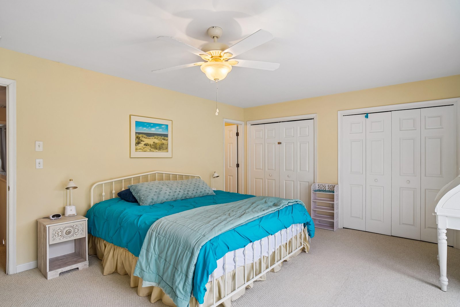 Settle into your bright, peaceful bedroom with a comfy bed, ample closet space, and coastal-inspired décor—your restful retreat after a day of adventure.