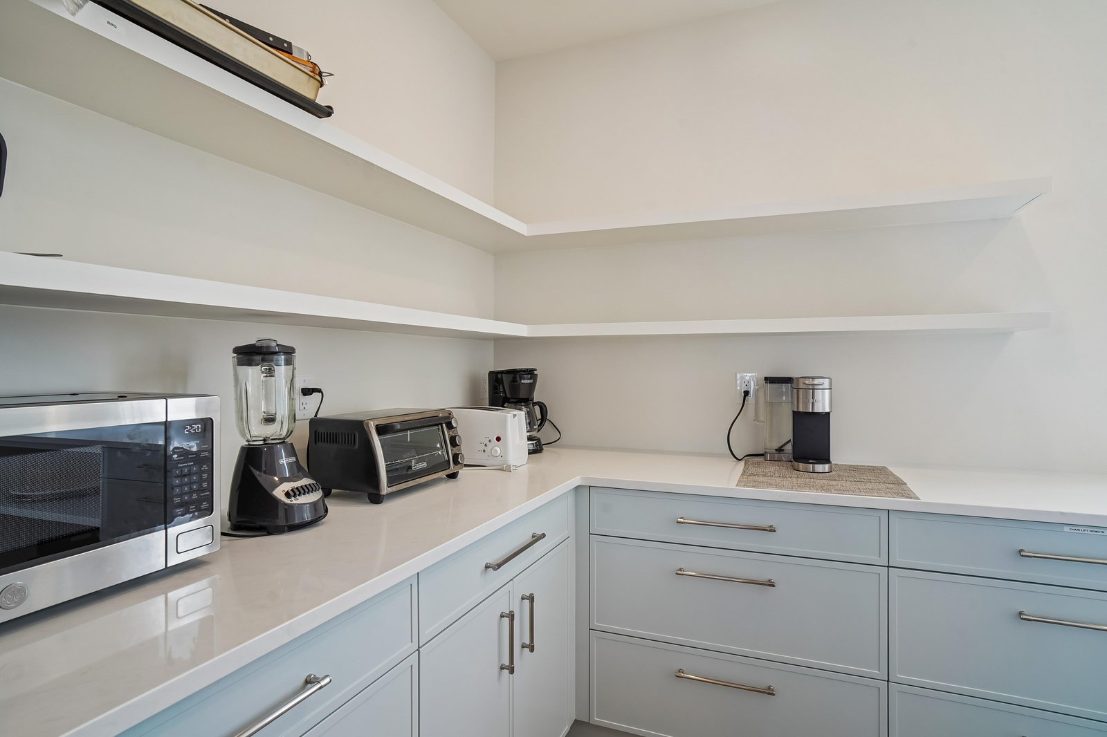 Your kitchen is stocked and ready with everything you need—microwave, blender, coffee maker, and toaster—so you can whip up quick bites or brew that perfect morning coffee.