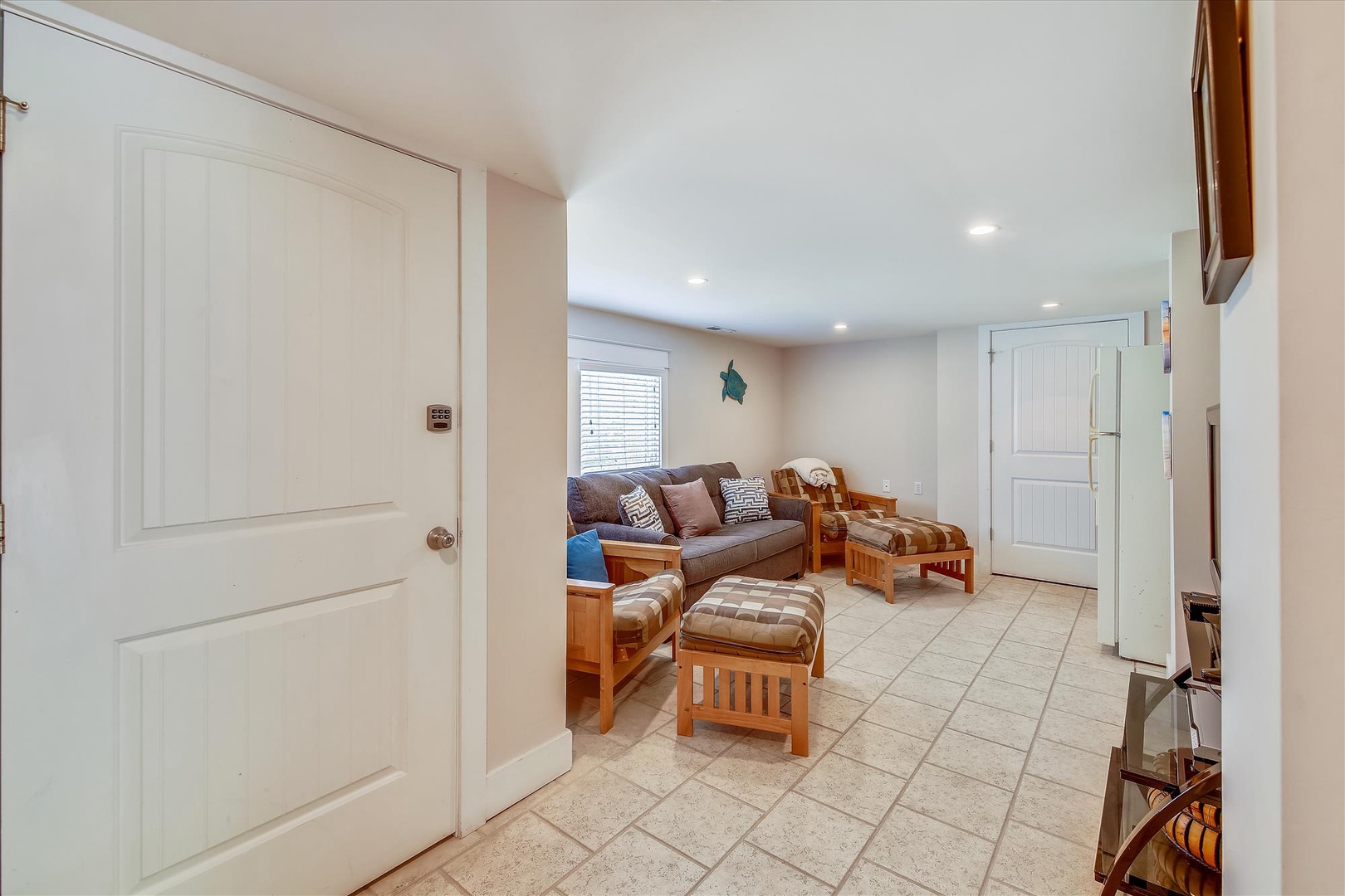 Settle into your comfortable living space with inviting seating, warm wood accents, and plenty of natural light—perfect for relaxing after a day of adventure.