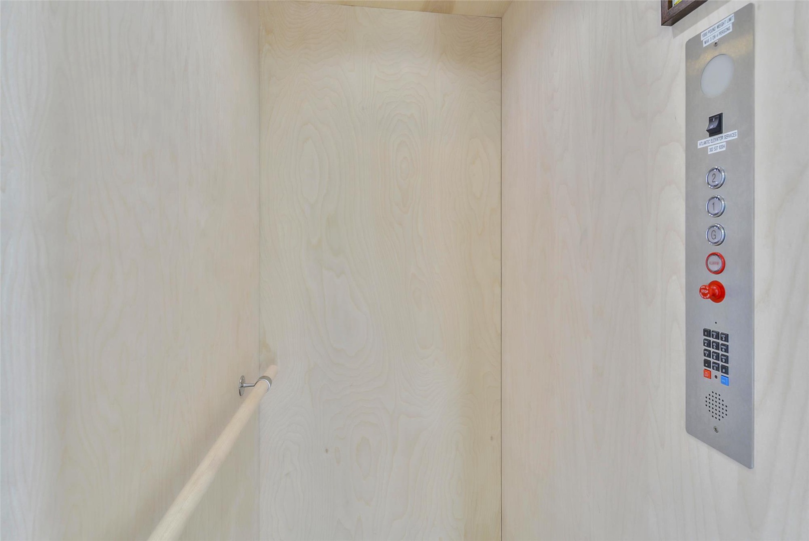 Easy access to all floors with a modern, accessible elevator featuring safety handrails and intuitive controls for your convenience.