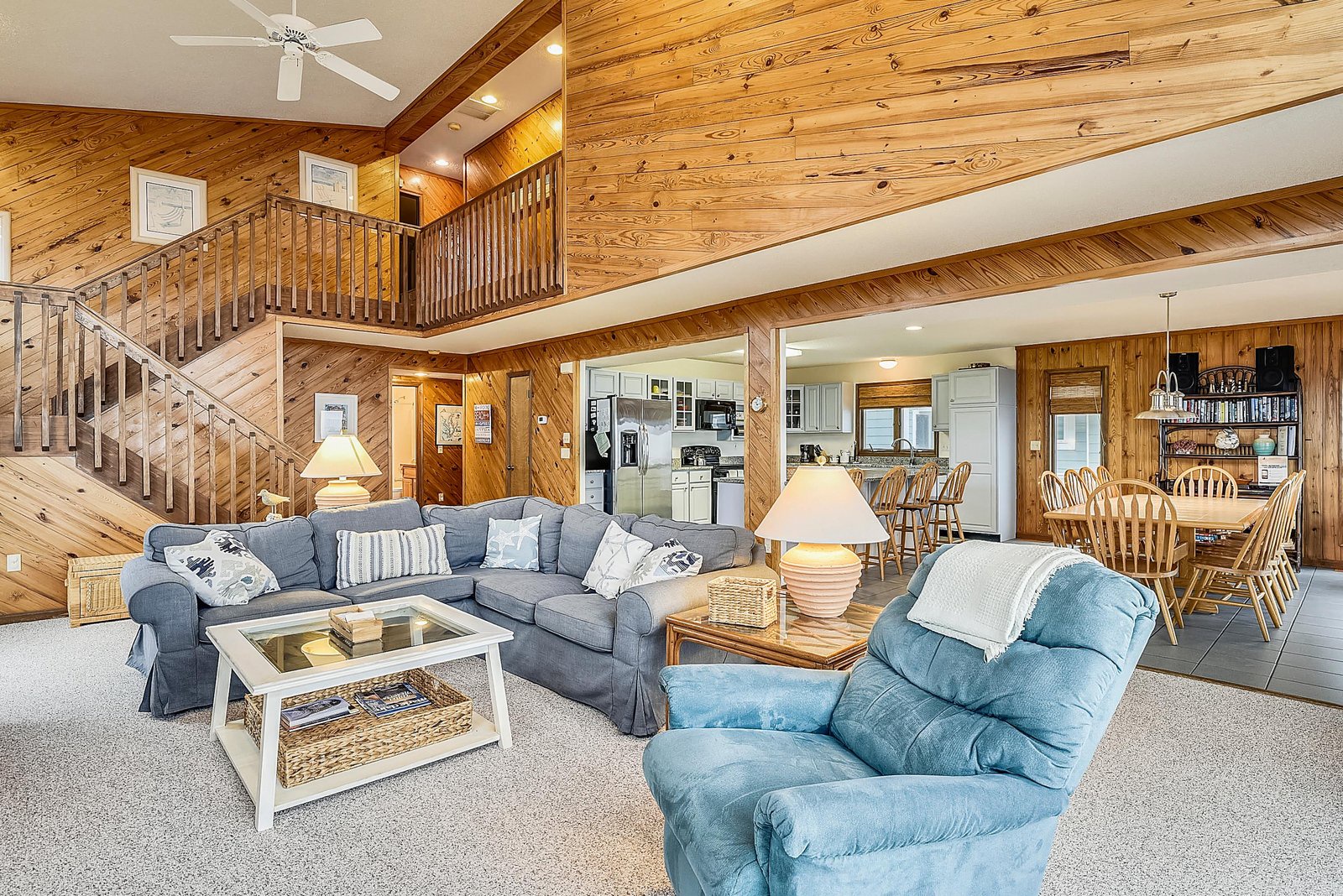 Sink into the plush sectional or cozy recliner and feel the warm embrace of knotty pine surrounding you, inviting your family to gather and create lasting memories together.
