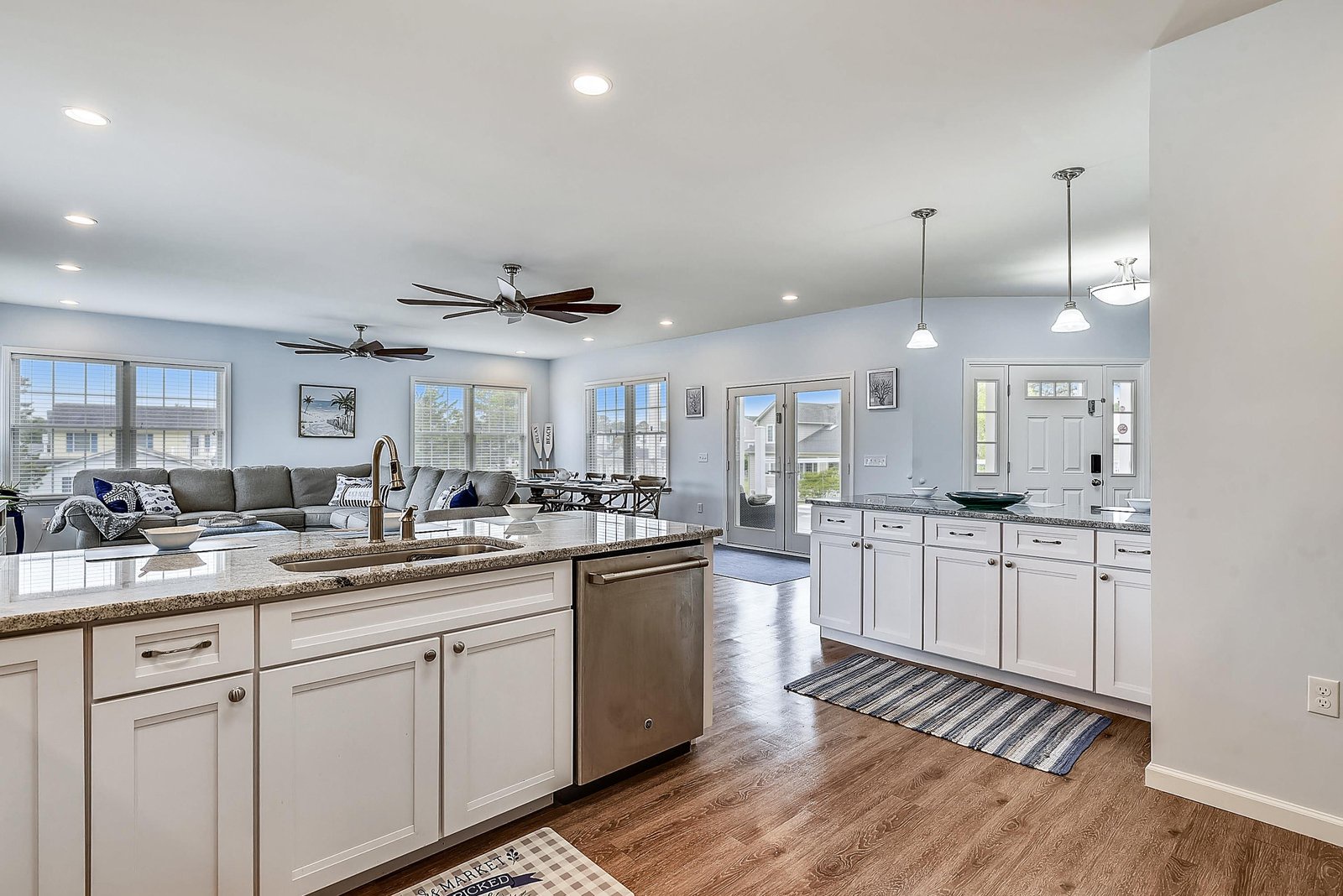 Step into a bright, open-concept space where your kitchen flows seamlessly into the living area—perfect for gathering, cooking, and relaxing all in one inviting retreat.