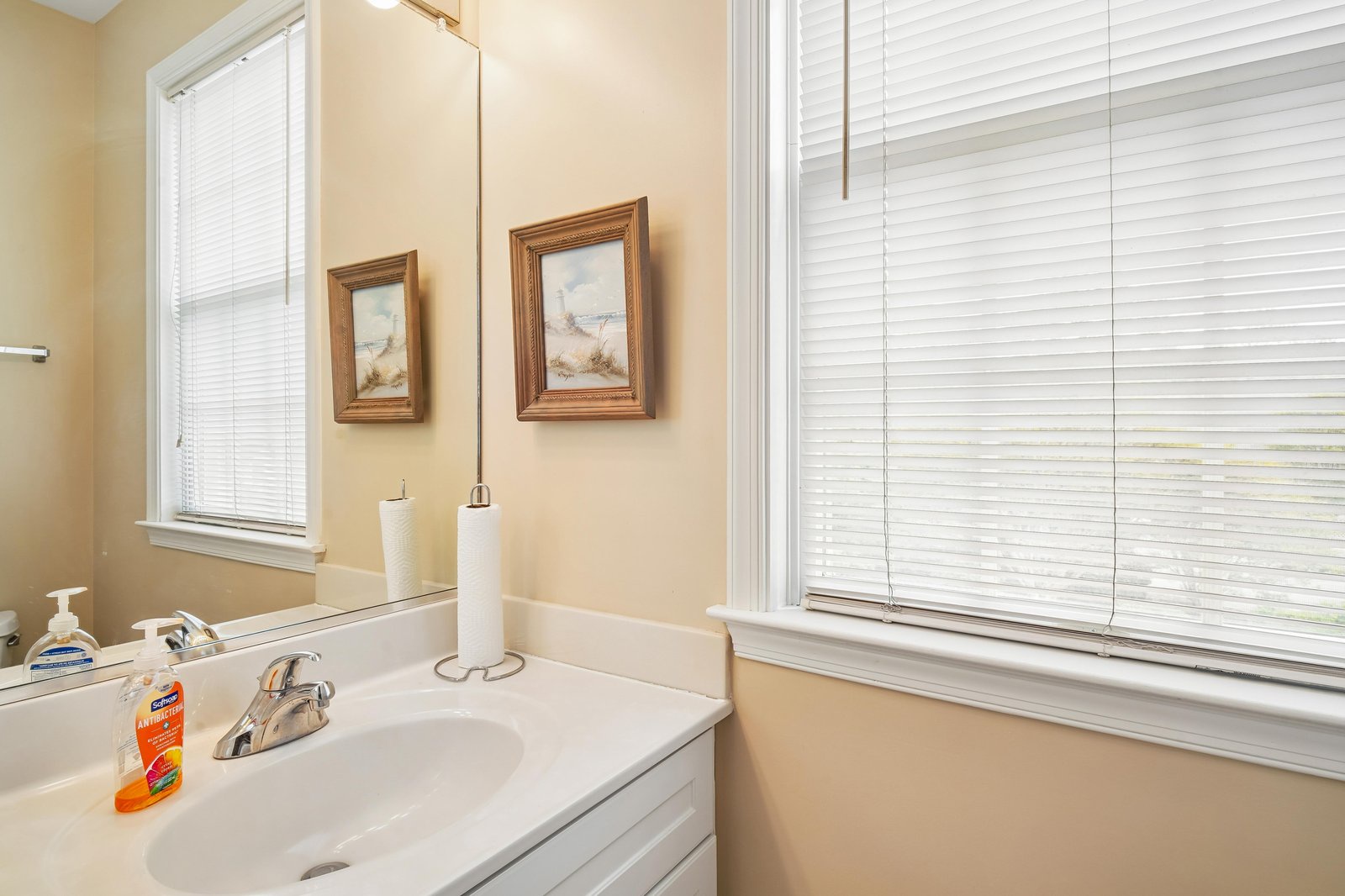 Light-filled bathroom with clean lines and thoughtful touches, offering you a bright, welcoming space to refresh each morning.