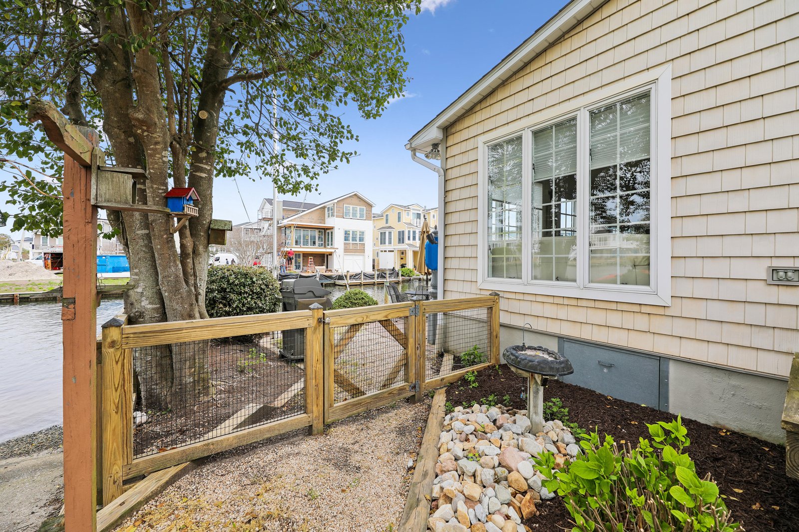 A waterside property in a peaceful coastal neighborhood, with easy access to the nearby waterways and surrounding community.