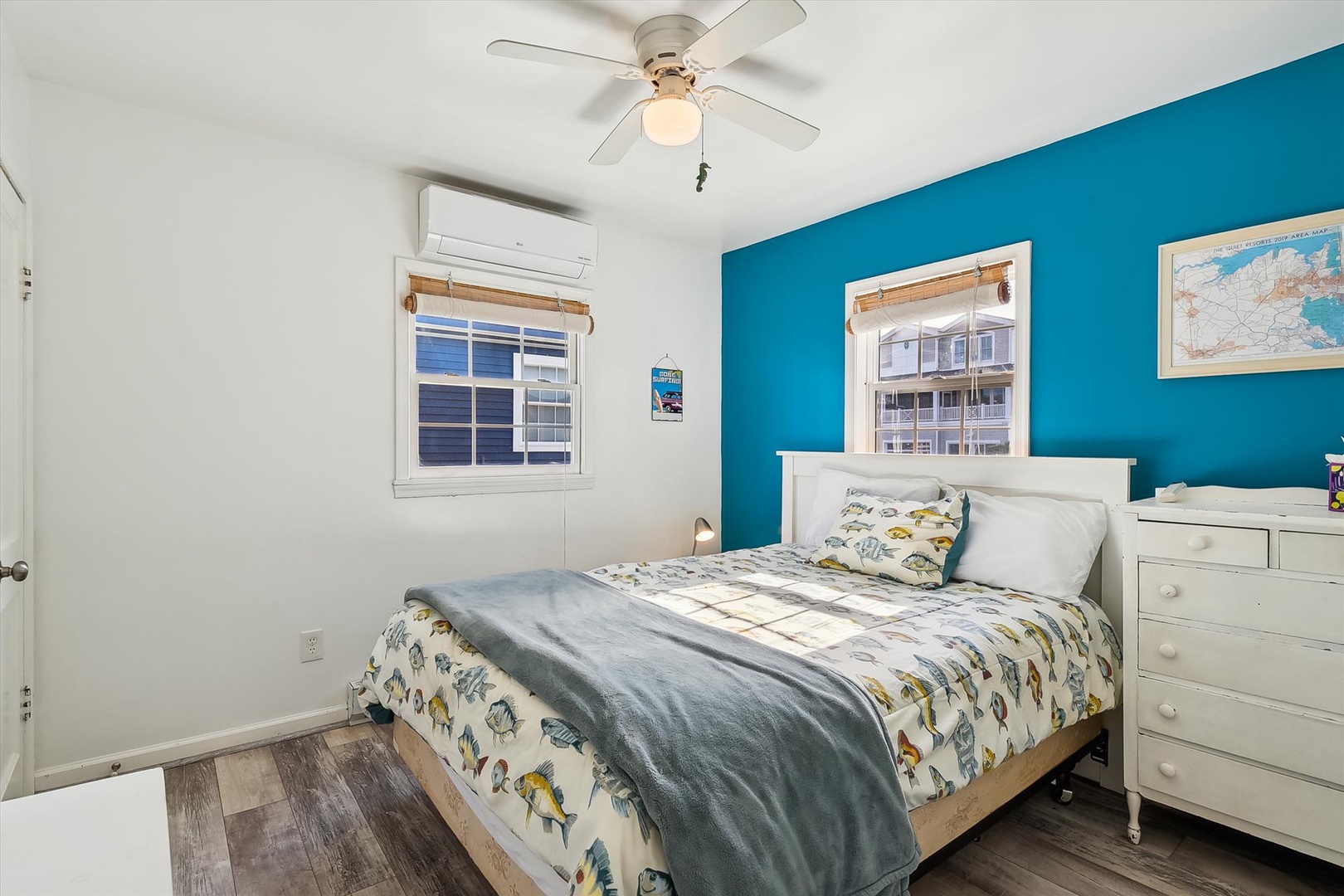 Settle into your cozy bedroom with cheerful accent walls, plush bedding, and refreshing air conditioning to keep you comfortable throughout your stay.