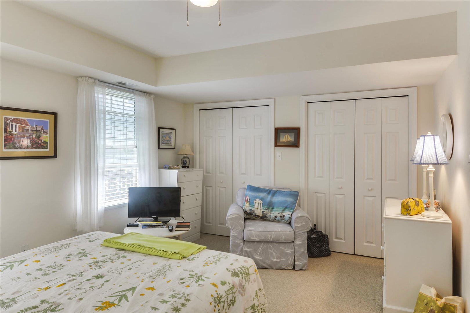 Settle into your peaceful bedroom retreat, where bright natural light, comfortable seating, and ample storage create the perfect space for relaxation and unwinding after your adventures.