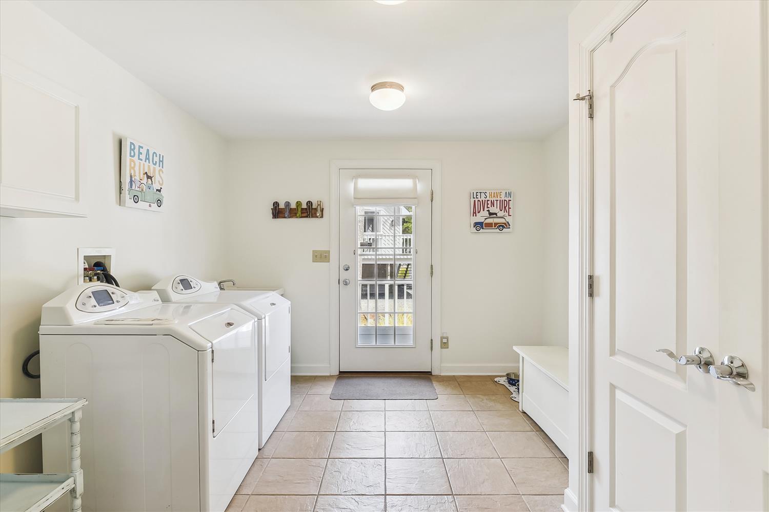 Your laundry room is bright, organized, and ready for your convenience, with a charming beachy vibe to make chores feel a little more like vacation.