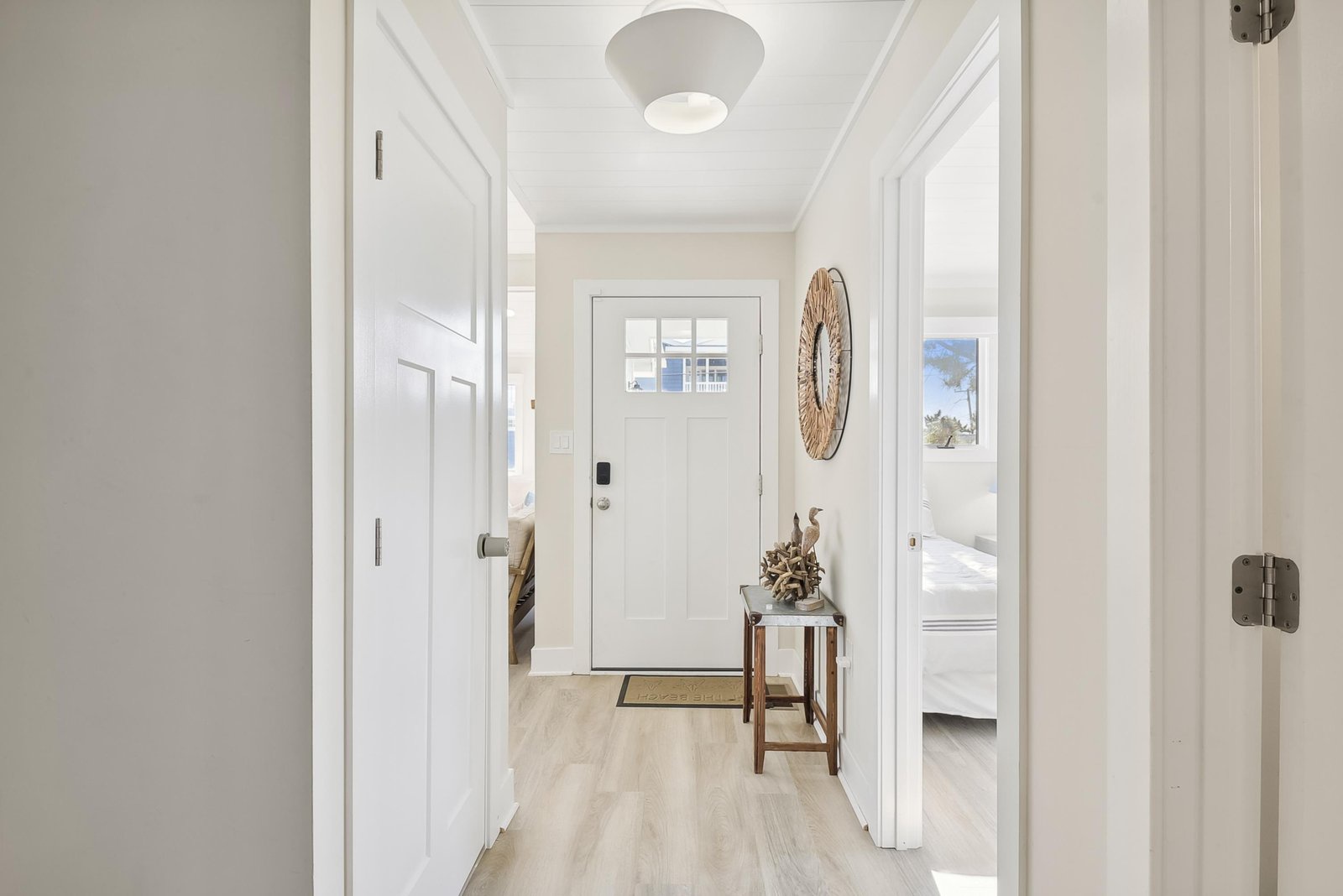 Step into your serene coastal retreat, where soft natural light and calming tones welcome you home. Thoughtful touches of driftwood and peaceful décor set the stage for your relaxing getaway.