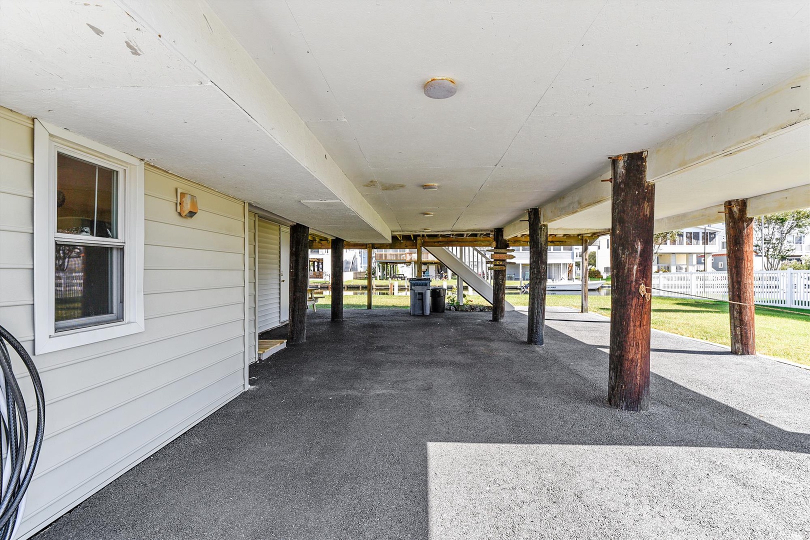 Covered ground-level parking provides convenient shelter for your vehicle, with direct access to the property in a quiet residential neighborhood.