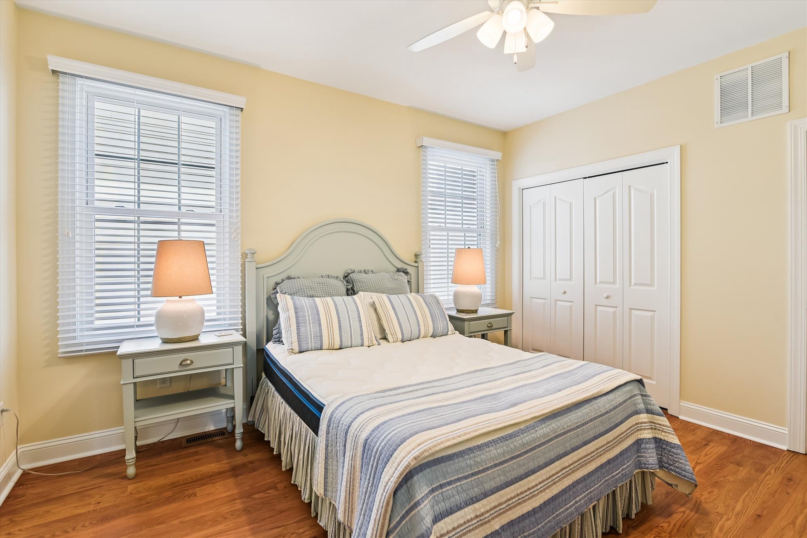 Your cozy retreat awaits with soft coastal linens, warm natural light, and charming details. Relax under the ceiling fan after a day exploring, surrounded by soothing colors and thoughtful touches that make you feel right at home.