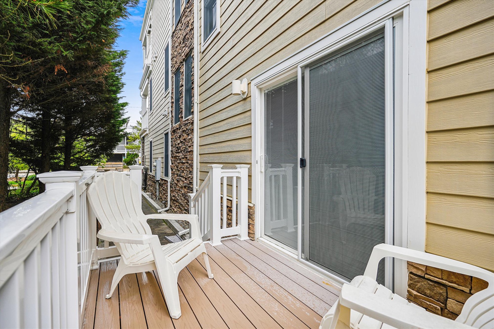 Step onto your private balcony to unwind in cozy outdoor seating, surrounded by fresh air and natural greenery—perfect for morning coffee or evening relaxation.