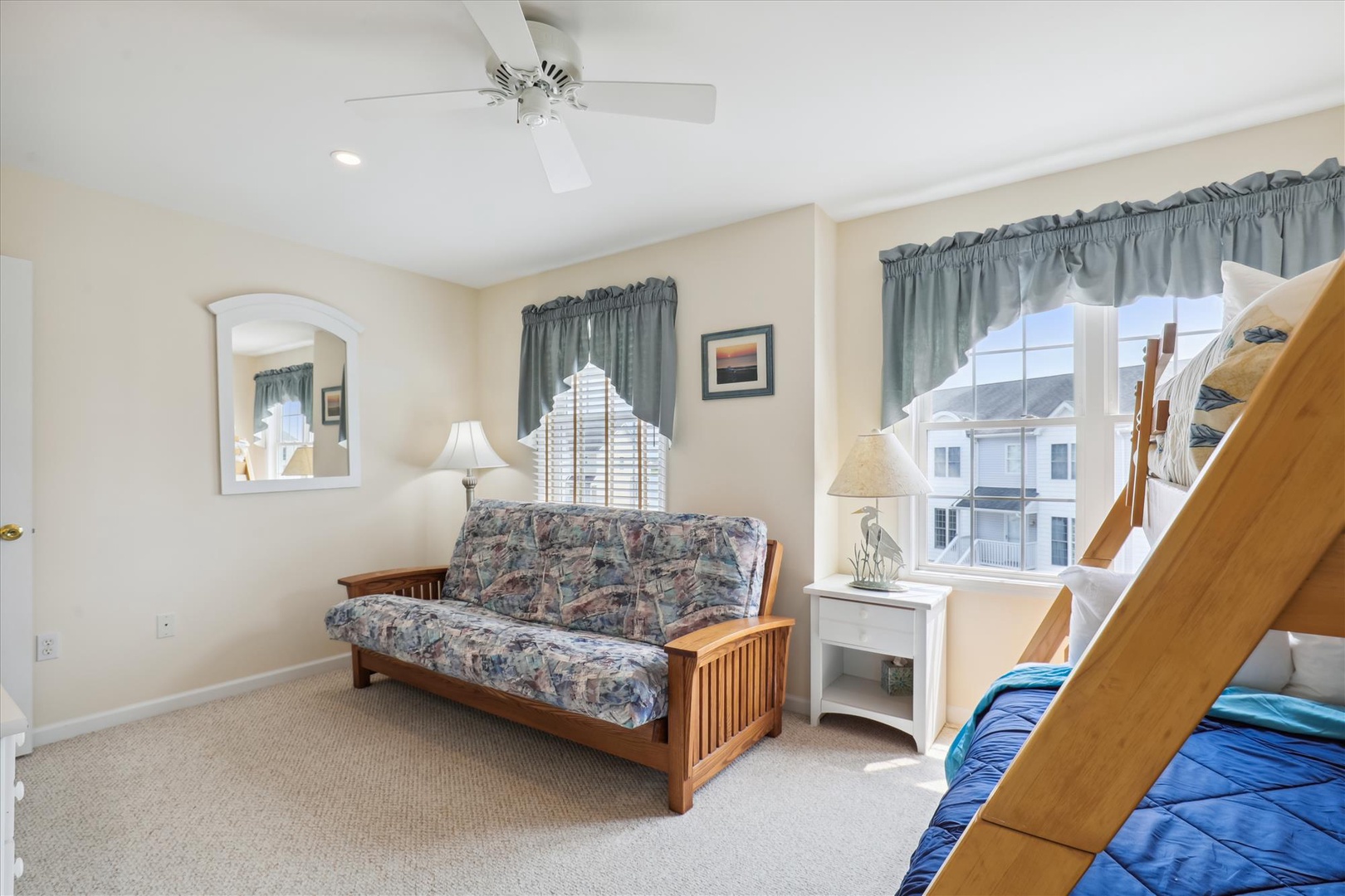 Your bright, airy room combines comfort and flexibility with a cozy futon and bunk bed, perfect for gathering or relaxing after a day of seaside adventures.