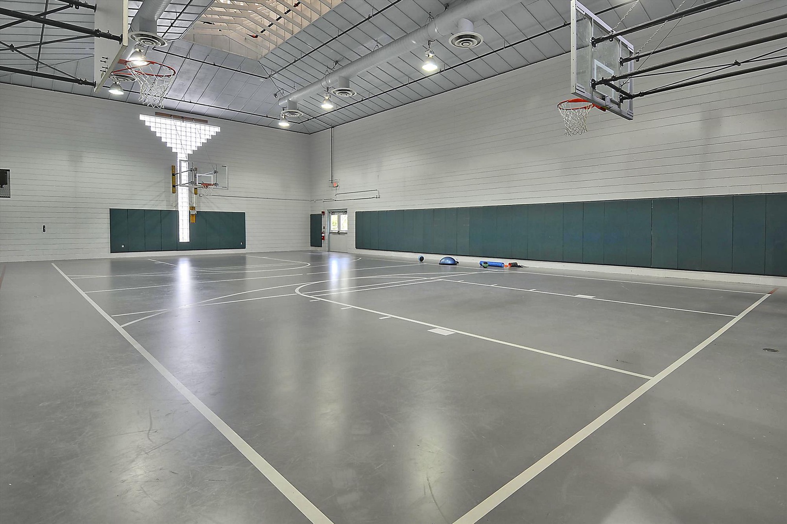 Shoot hoops, play pickup games, or challenge friends in your private indoor basketball court—perfect for active days and friendly competition.
