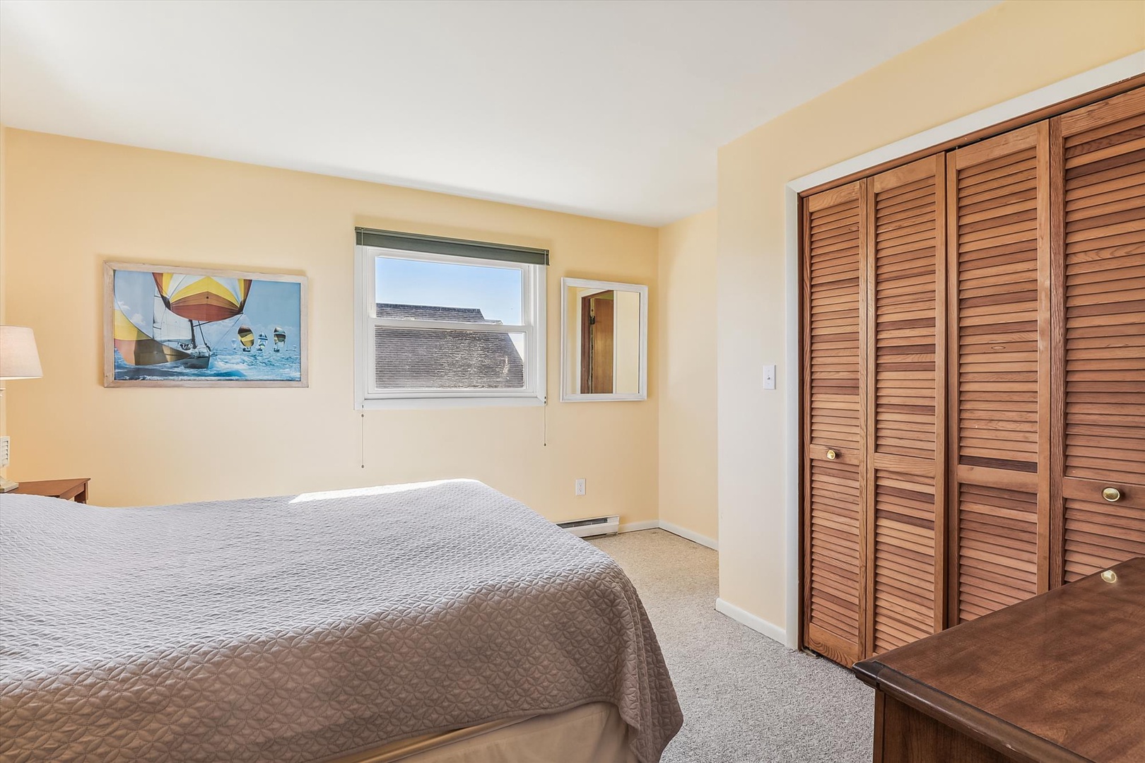 Unwind in your cozy bedroom with warm tones, coastal artwork, and generous closet space for all your getaway essentials.