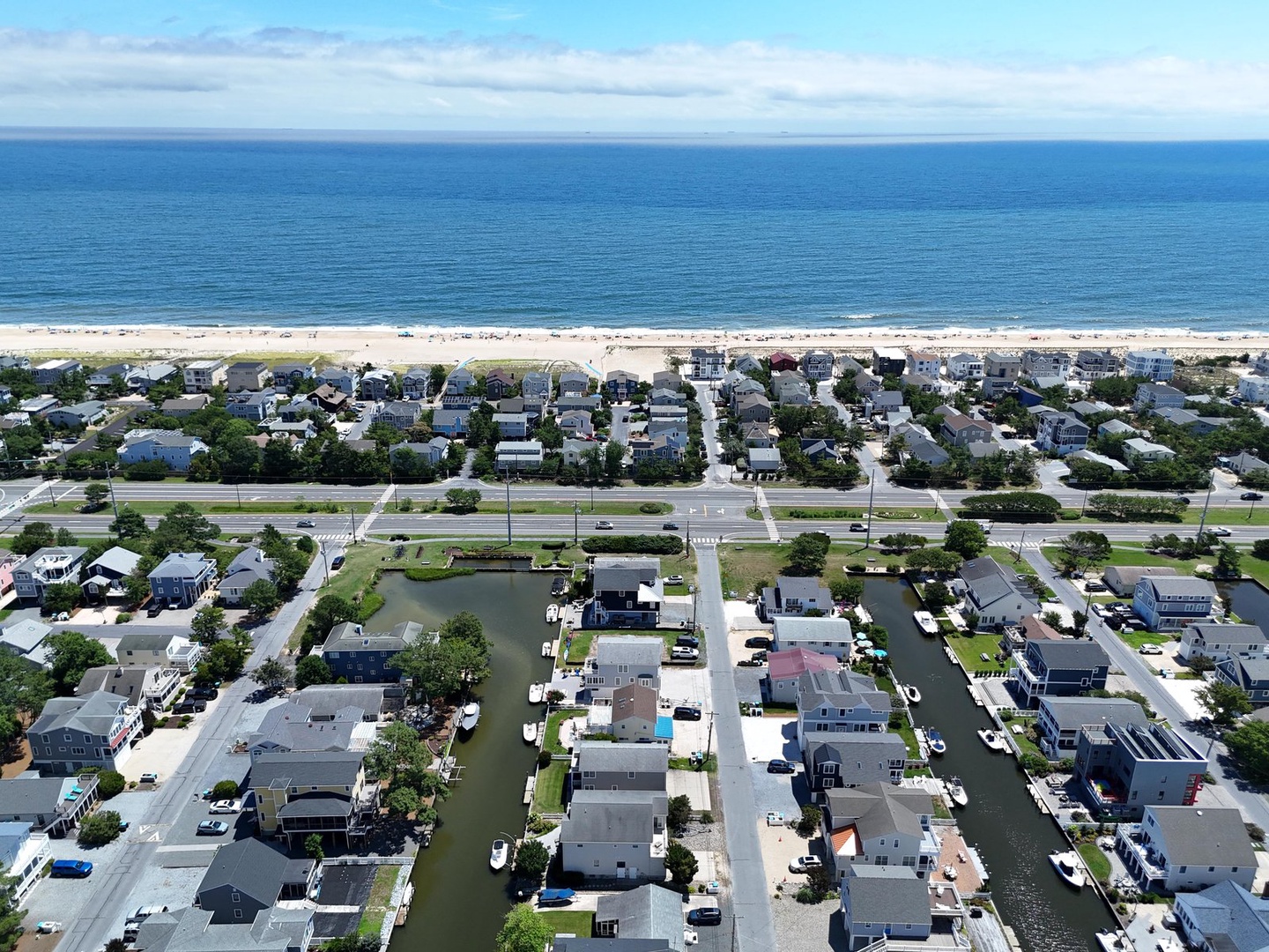 A beautiful waterfront community where sandy shores meet peaceful canals lined with beach homes. The area offers easy access to the ocean and a relaxed coastal neighborhood setting.