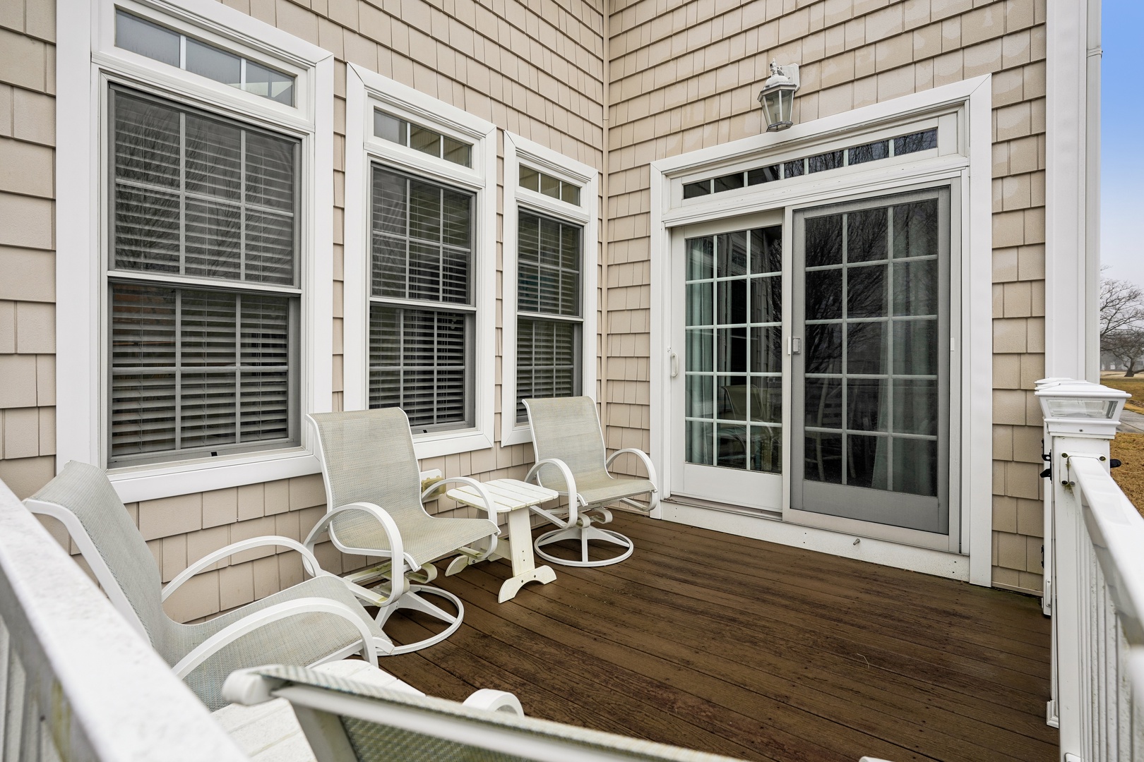 Step onto your private deck where comfortable seating awaits your morning coffee and evening relaxation moments.