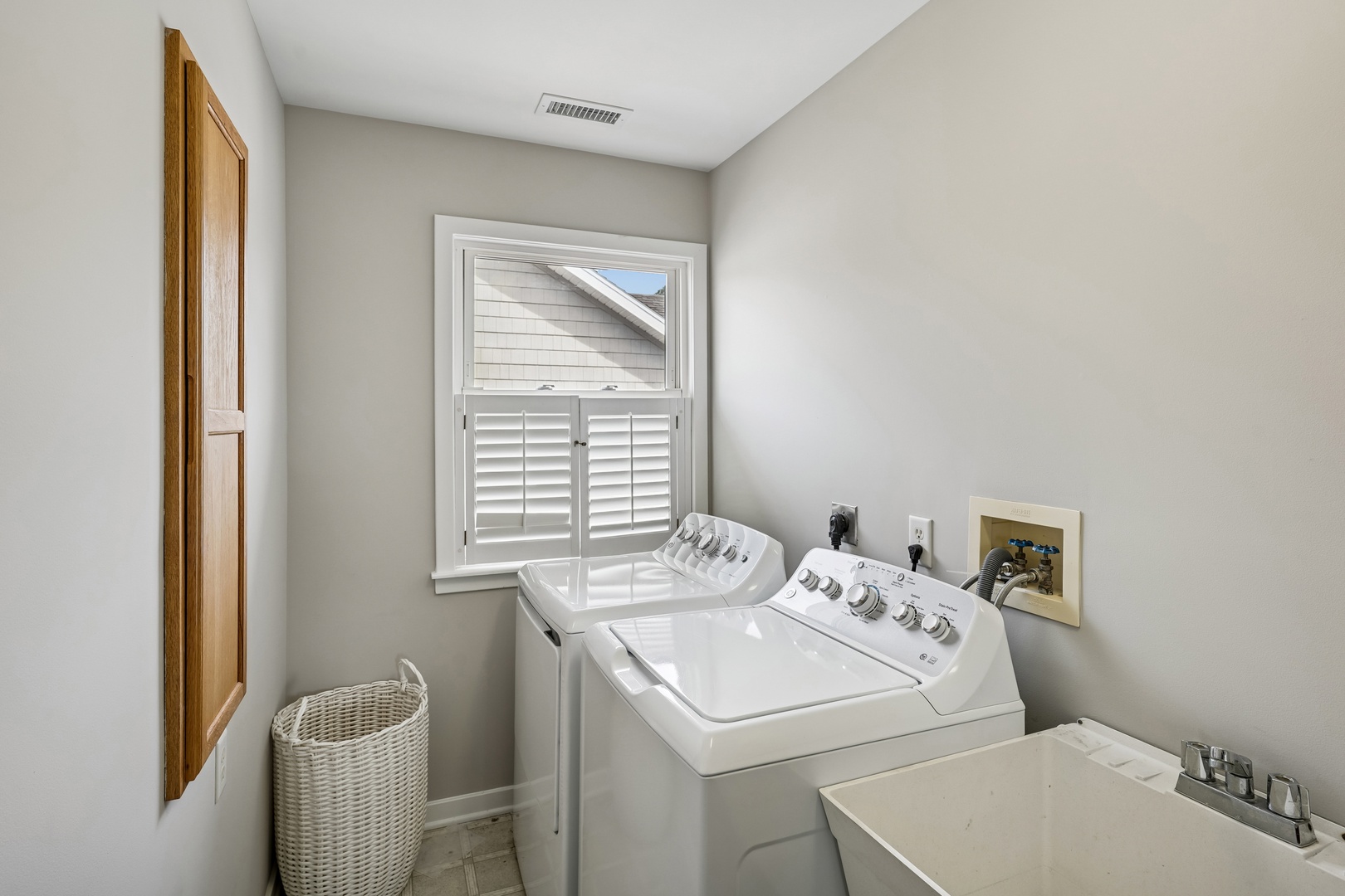 Your dedicated laundry room makes vacation life effortless with full-size washer and dryer, plus a handy utility sink for any task.