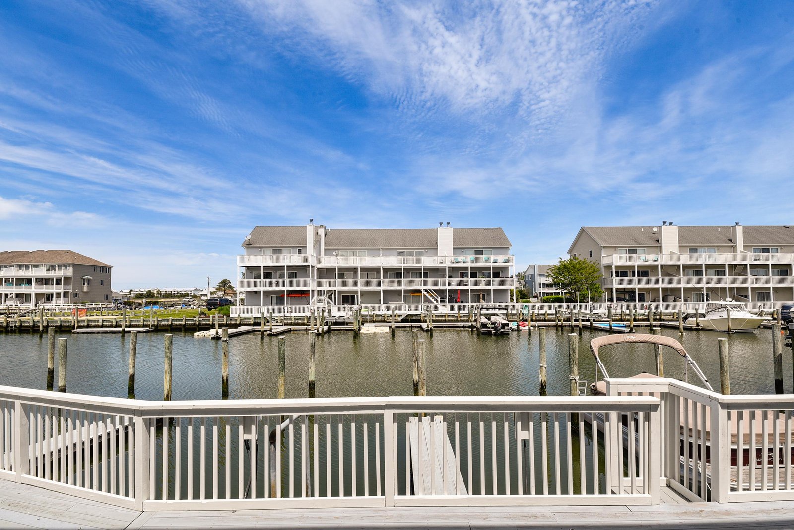 Waterfront marina property with private boat docks and slips for your aquatic adventures.