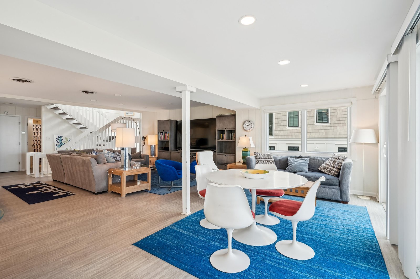 Bright, modern living space flows effortlessly from lounge to dining area, inviting you to settle in and make yourself at home in this stylish retreat.