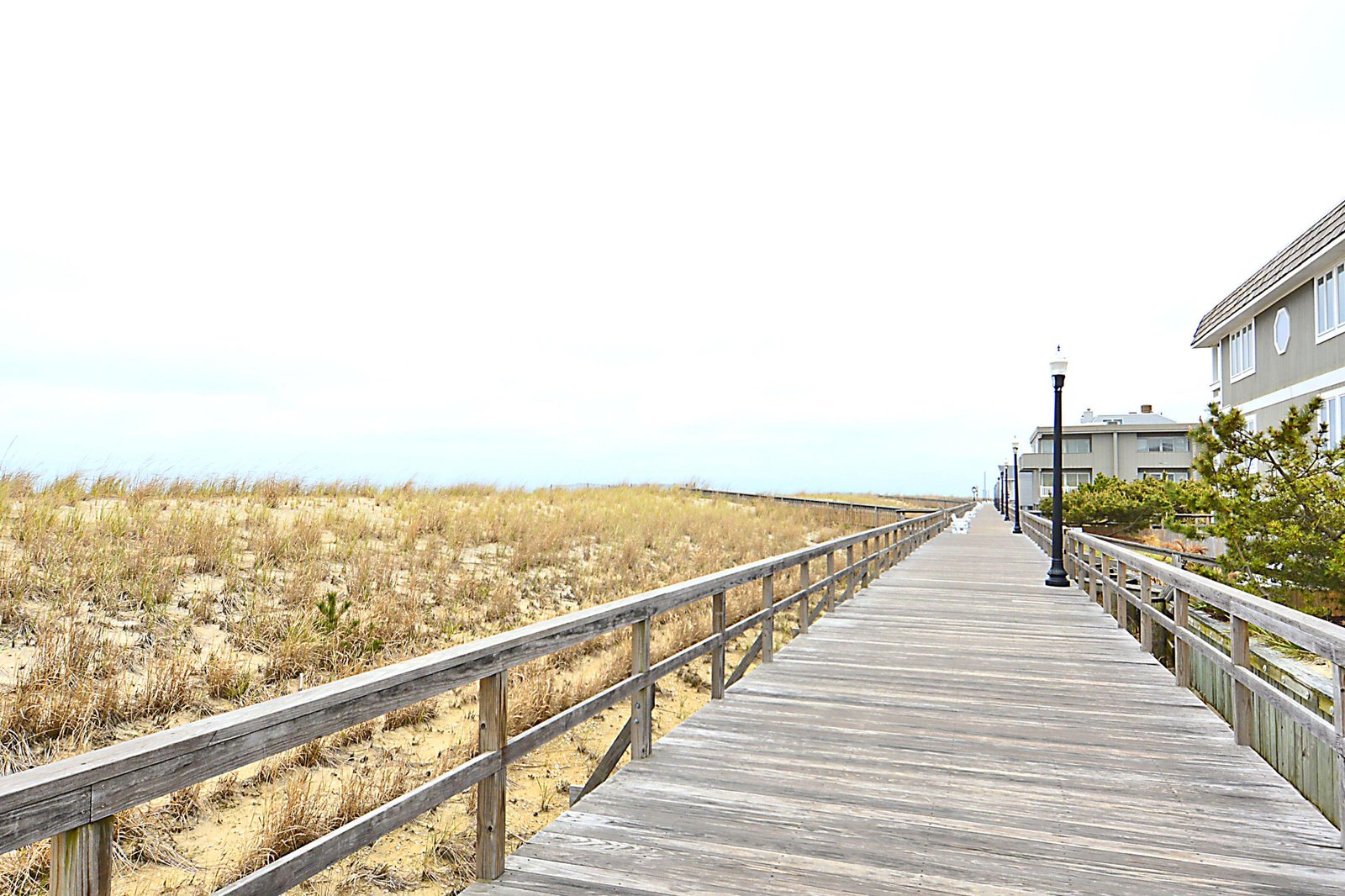 A wooden boardwalk leads from the property through the dunes toward the ocean, making beach access convenient and easy for your stay.