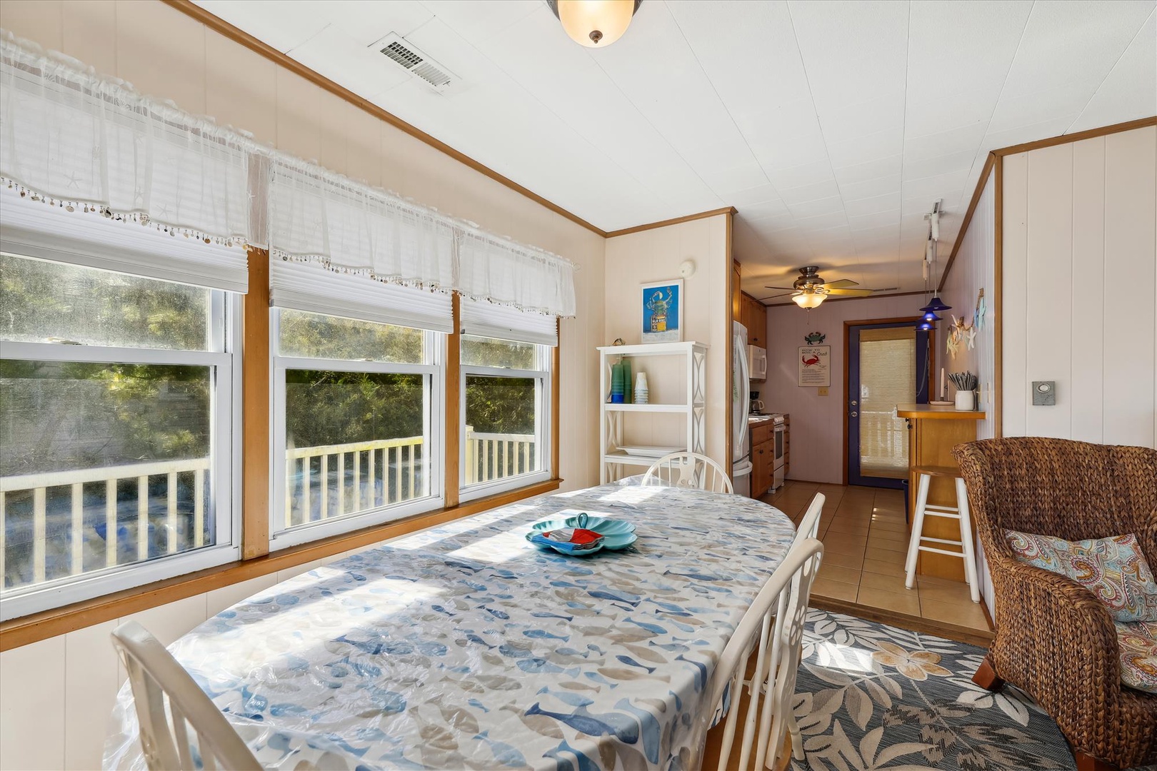 Relax at your private dining table surrounded by natural light and peaceful garden views—perfect for morning coffee or family meals.
