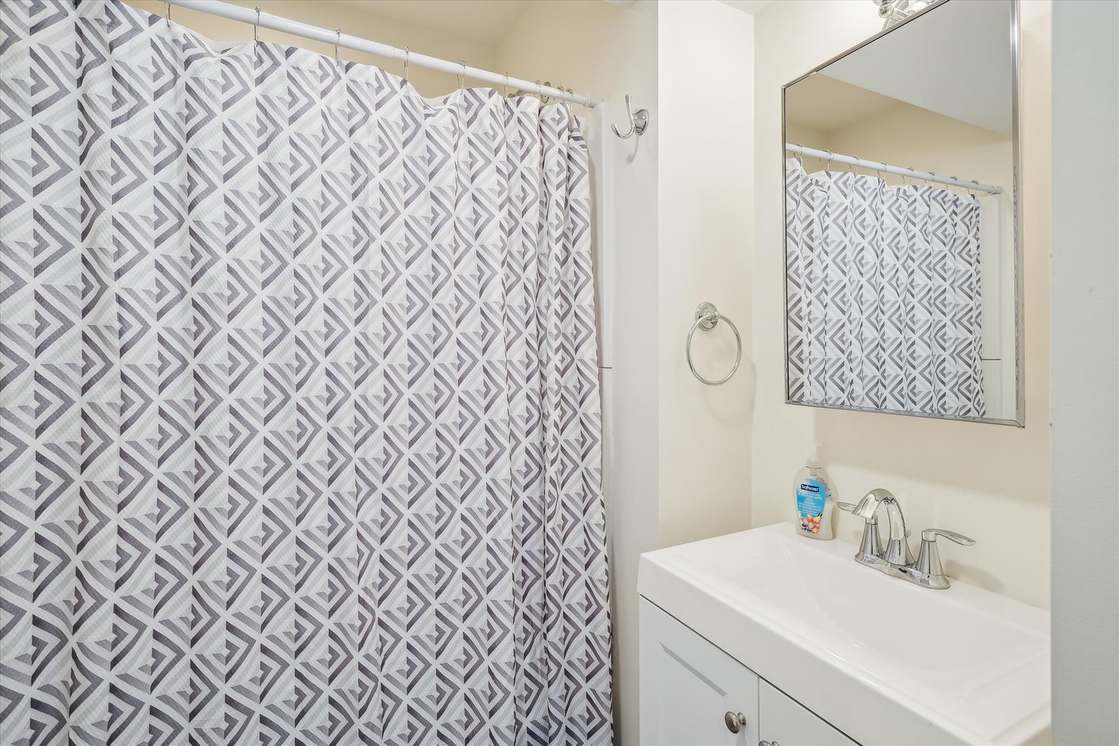 Step out of your shower and into a fresh, bright bathroom with modern touches and thoughtful details designed for your comfort.