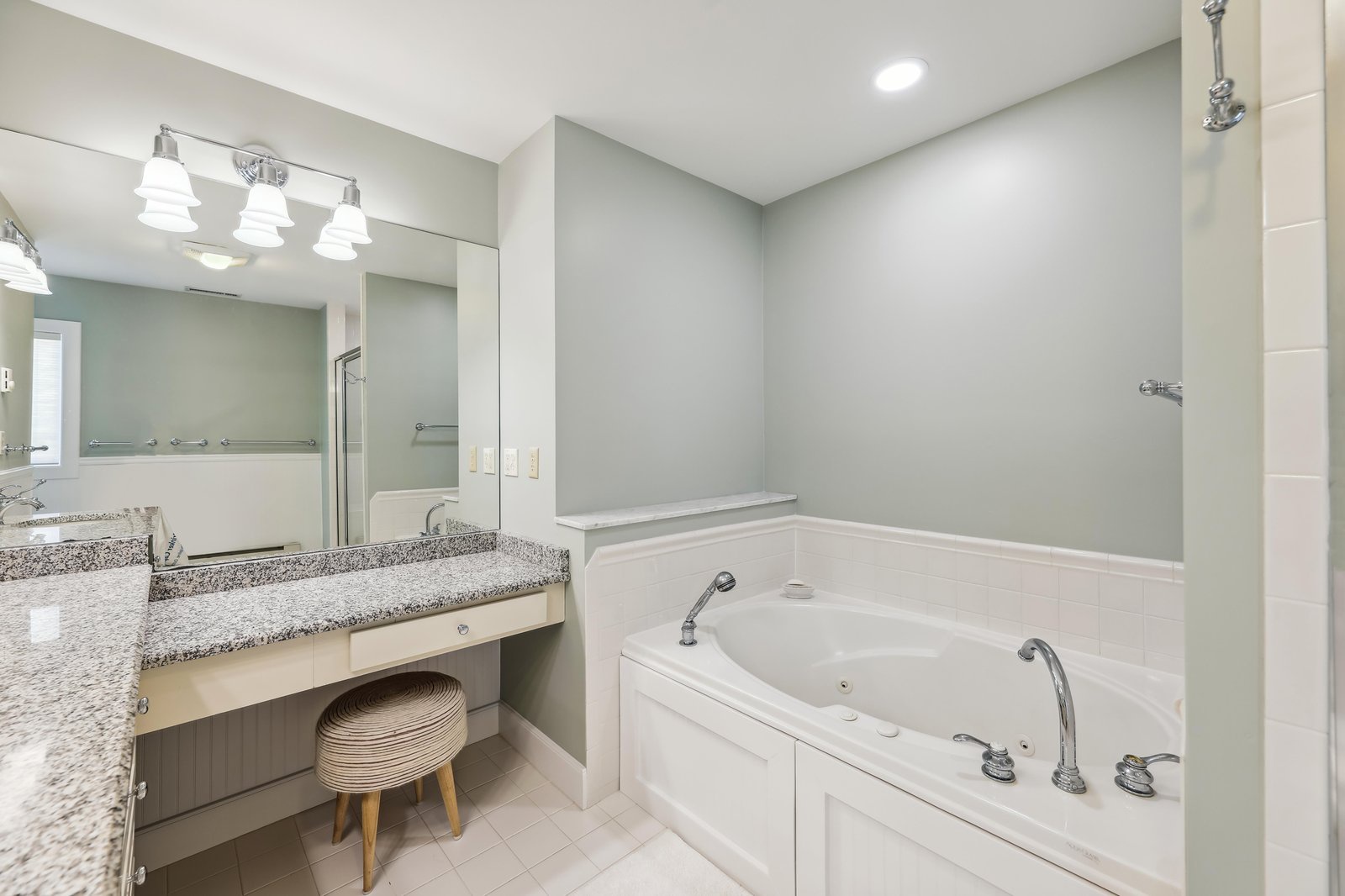 Sink into the spa-style soaking tub after a long day, or refresh yourself in the walk-in shower—your private bathroom invites you to unwind and recharge in serene comfort.