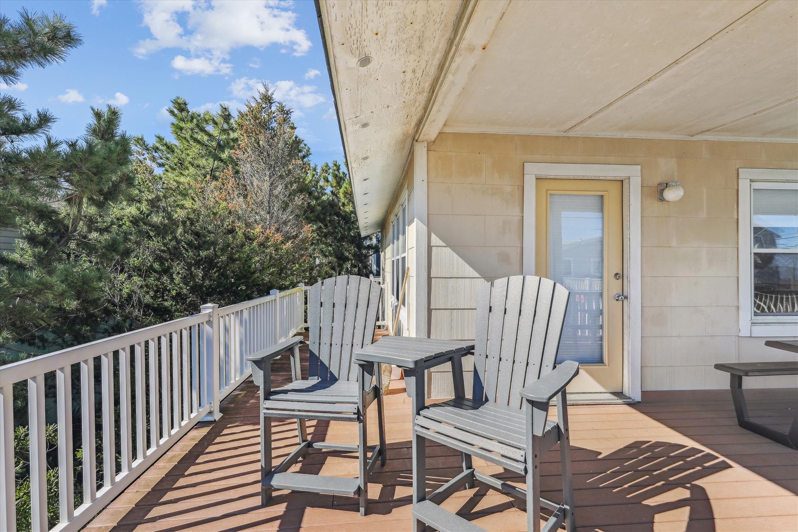 Picture yourself relaxing on your private deck with morning coffee, soaking in the fresh air and sunshine surrounded by towering pines—a peaceful outdoor space perfect for unwinding after adventures or simply enjoying nature's beauty.