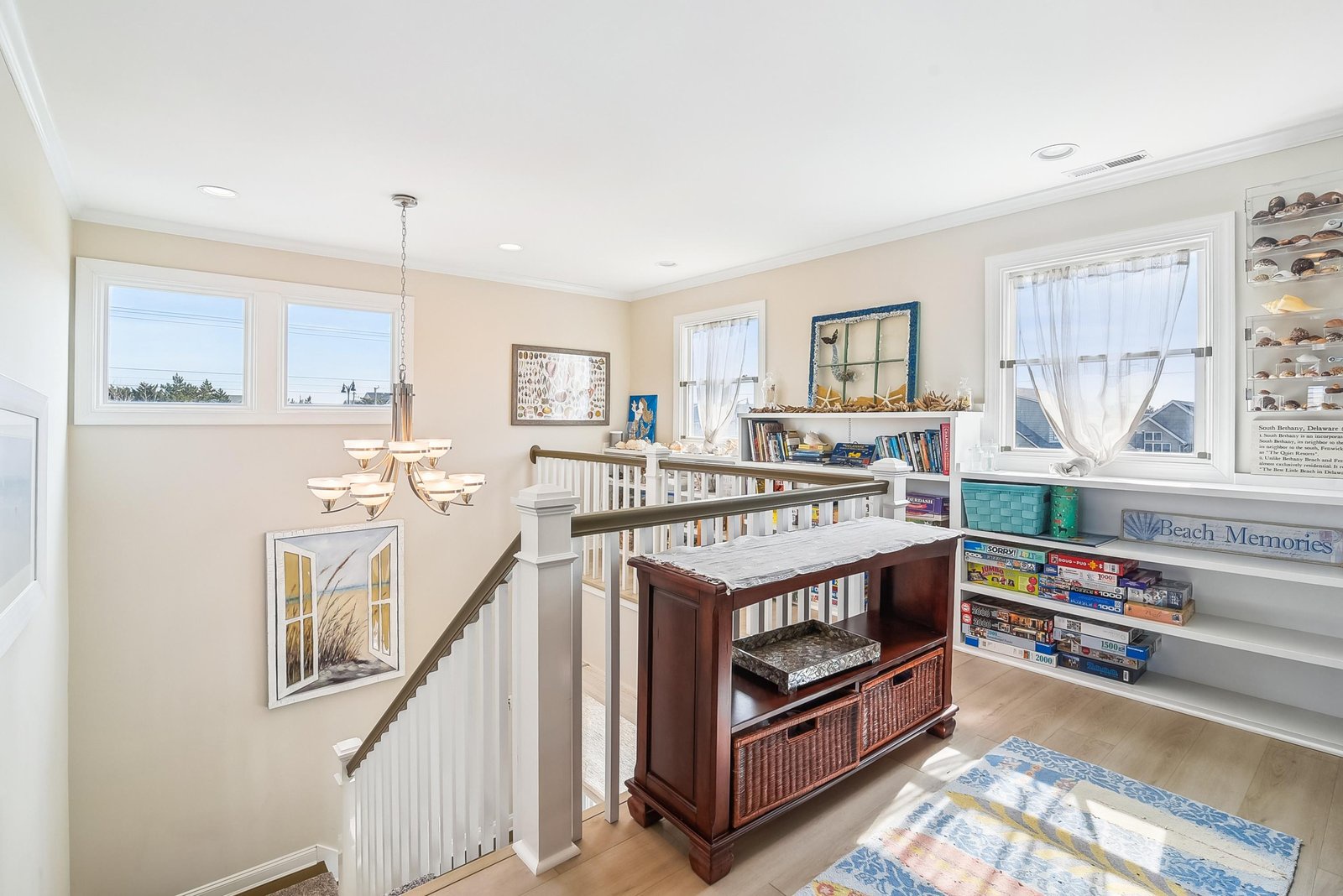 Gather for games and conversation in this bright, sun-filled space—perfect for beach-inspired fun and coastal relaxation.