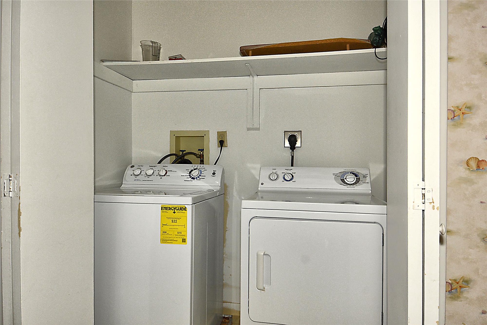 Your own in-unit washer and dryer make packing light a breeze, with convenient storage shelving above for all your essentials.