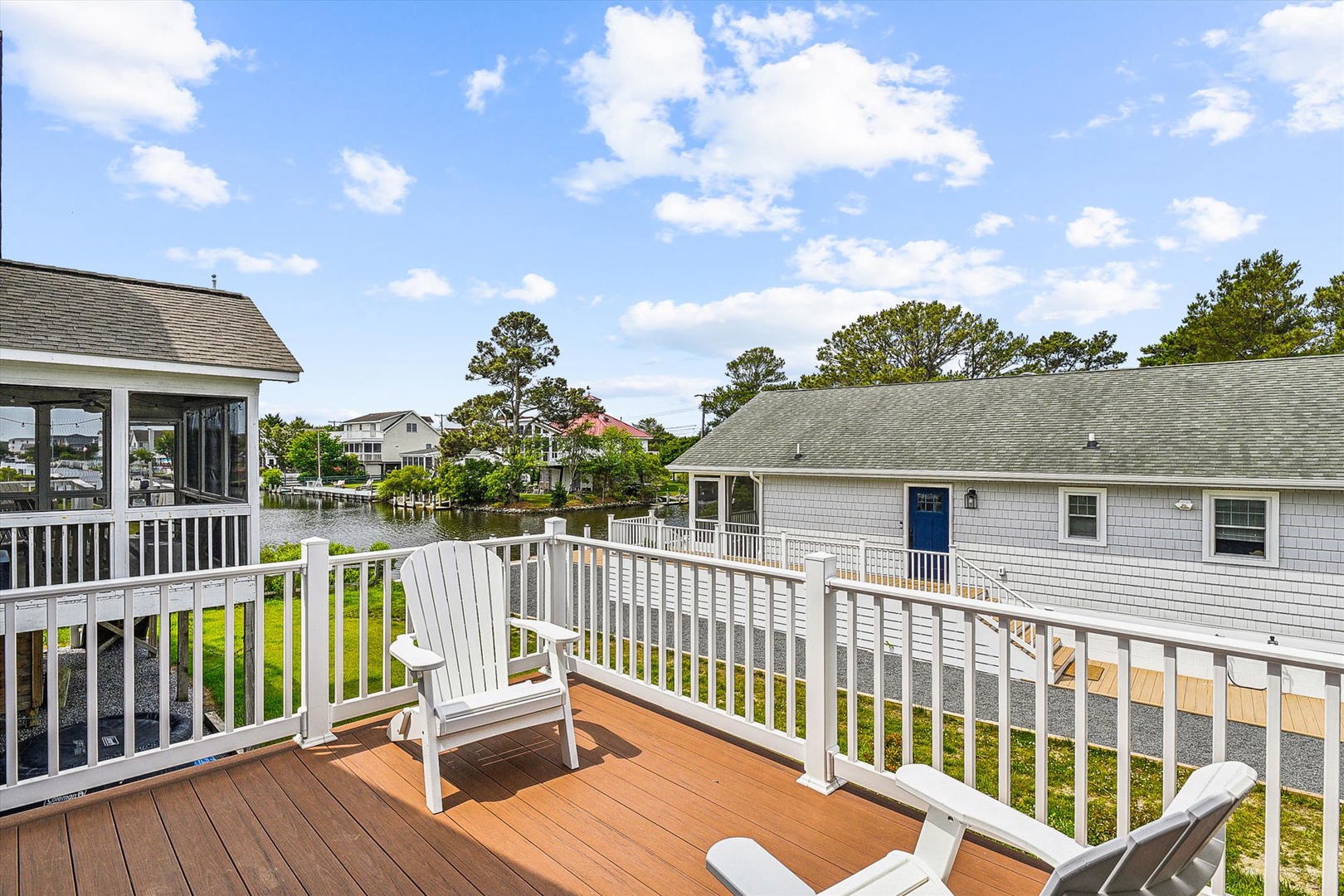 Relax on your private deck with serene waterfront views and classic coastal charm. Breathe in the fresh air while sipping morning coffee in your Adirondack chair, surrounded by peaceful canal scenery.