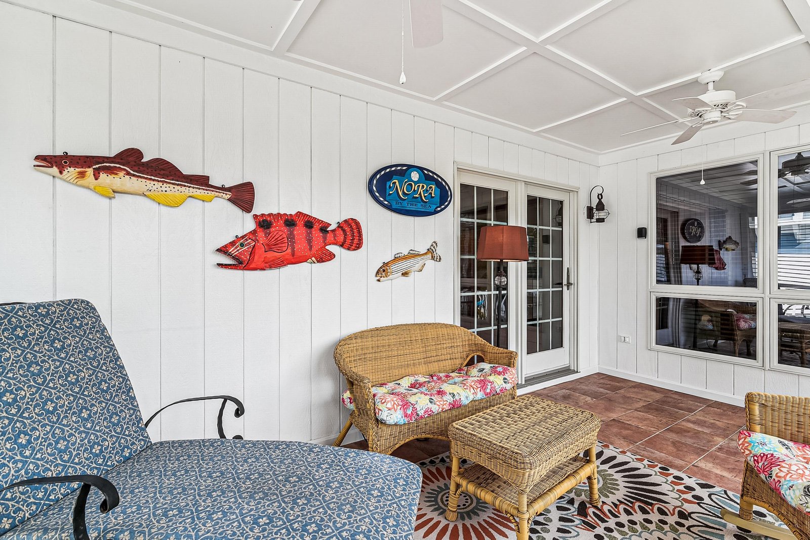 Settle into your private patio, complete with coastal charm and wicker furnishings, where breezy afternoons are best spent relaxing with a good book.
