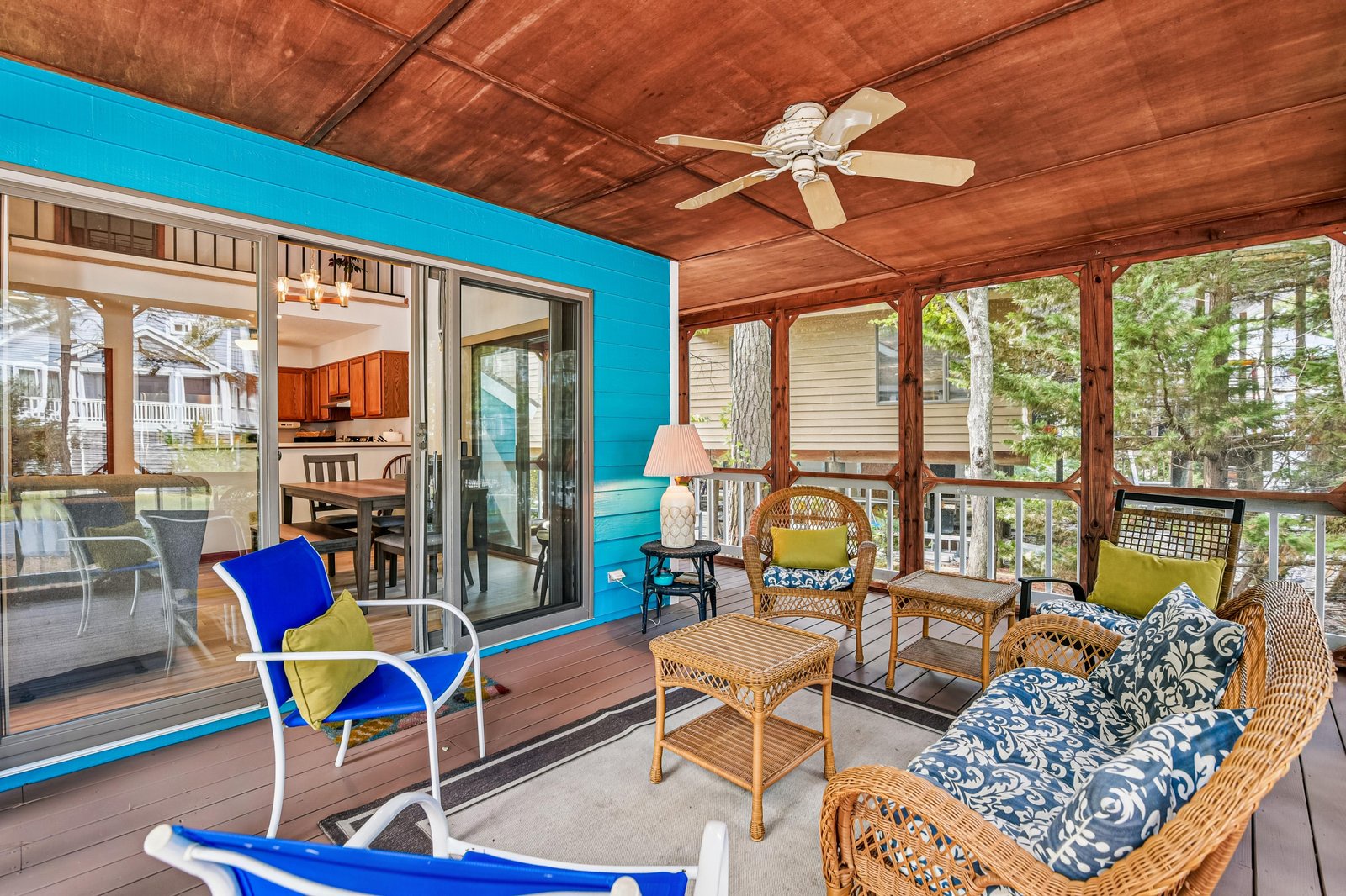 Relax in your private screened porch surrounded by trees, where ceiling fans keep you cool and wicker seating invites you to unwind with morning coffee or evening conversations.