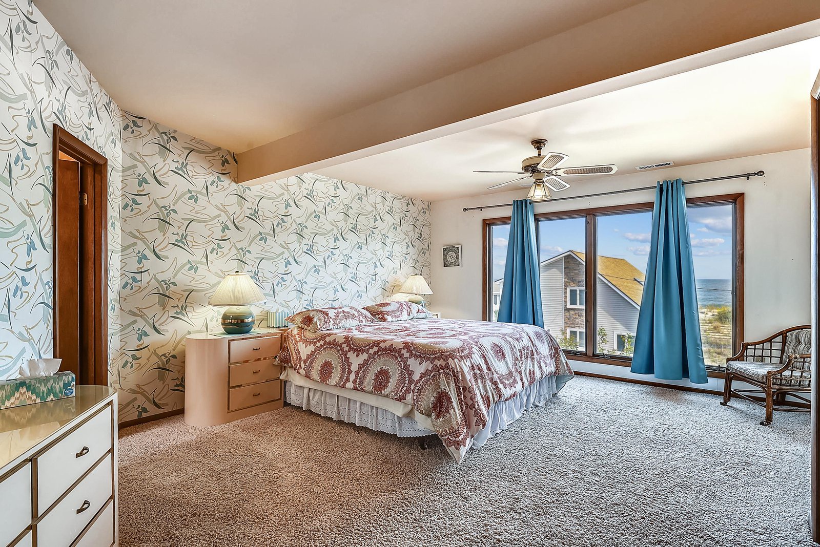Wake up to coastal views framed by your bedroom window, where soft breezes and ocean glimpses create your peaceful retreat.