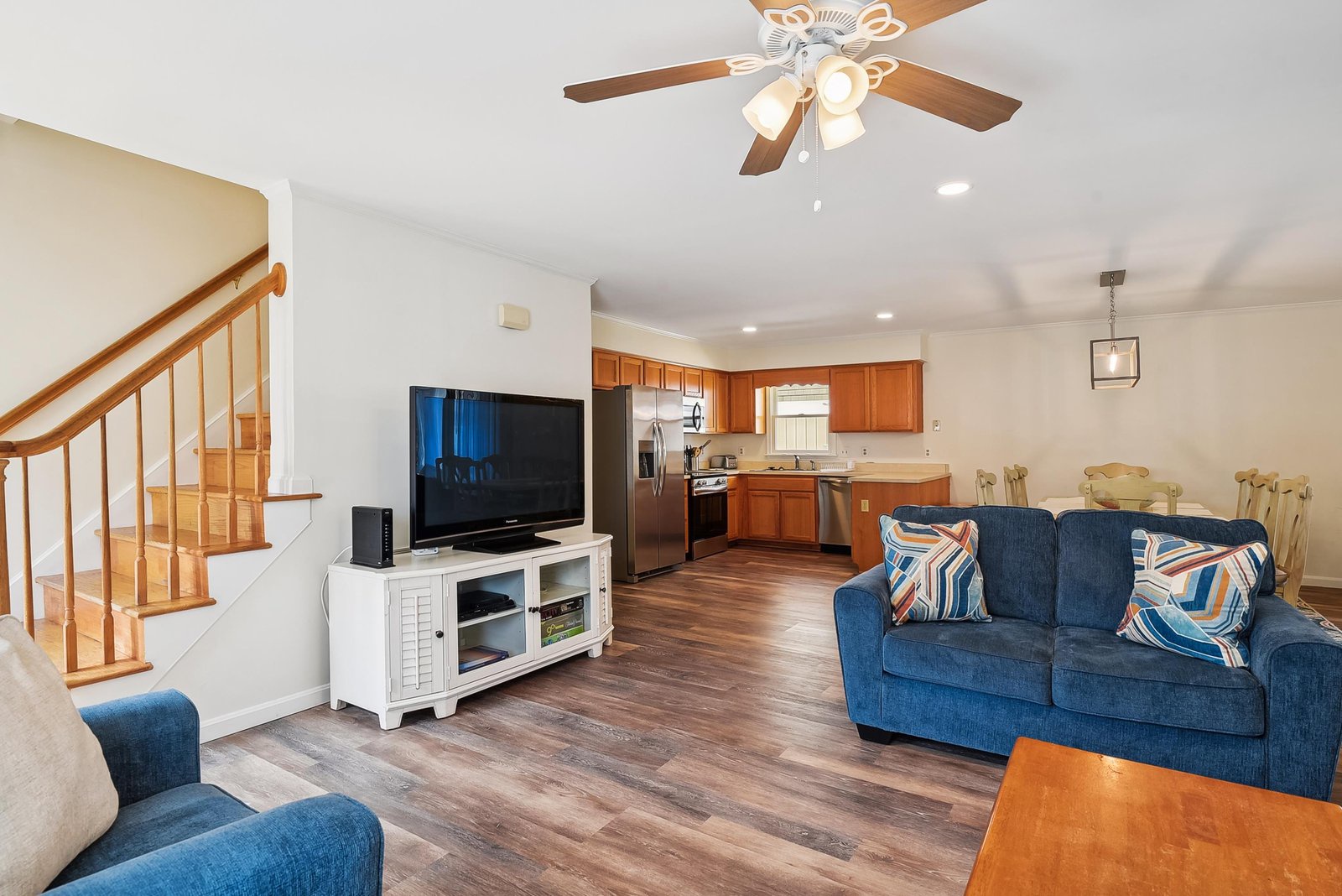 Relax in your open-plan living space with comfortable seating and a fully equipped kitchen, perfect for unwinding after a day of adventure.