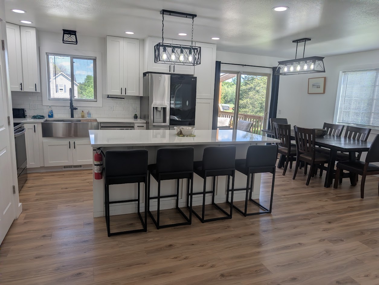 Gather with your loved ones at the spacious kitchen island for meals or conversation. Sleek countertops, modern appliances, and plenty of natural light create an inviting space where you'll feel right at home.