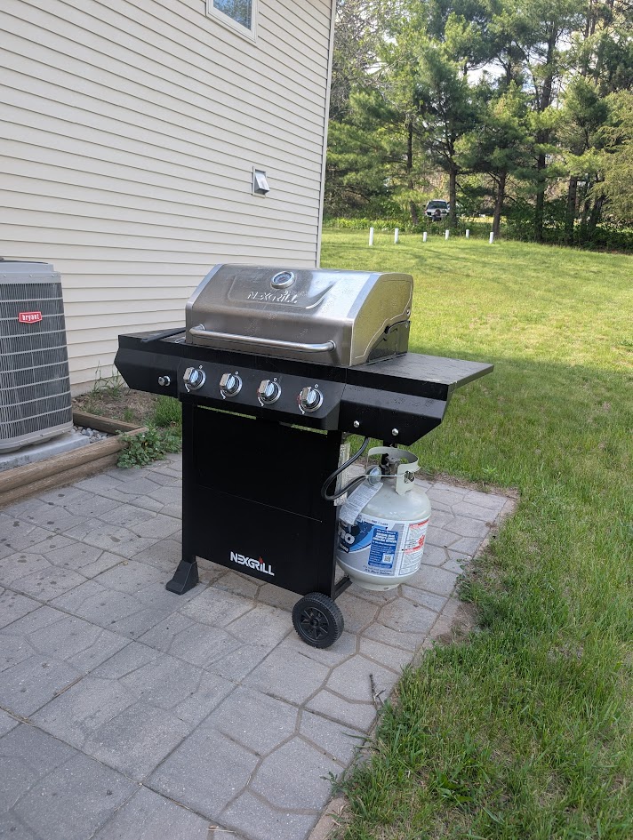 Fire up the grill on your private patio and enjoy outdoor dining surrounded by lush green lawns and mature trees—perfect for summer cookouts and fresh air.