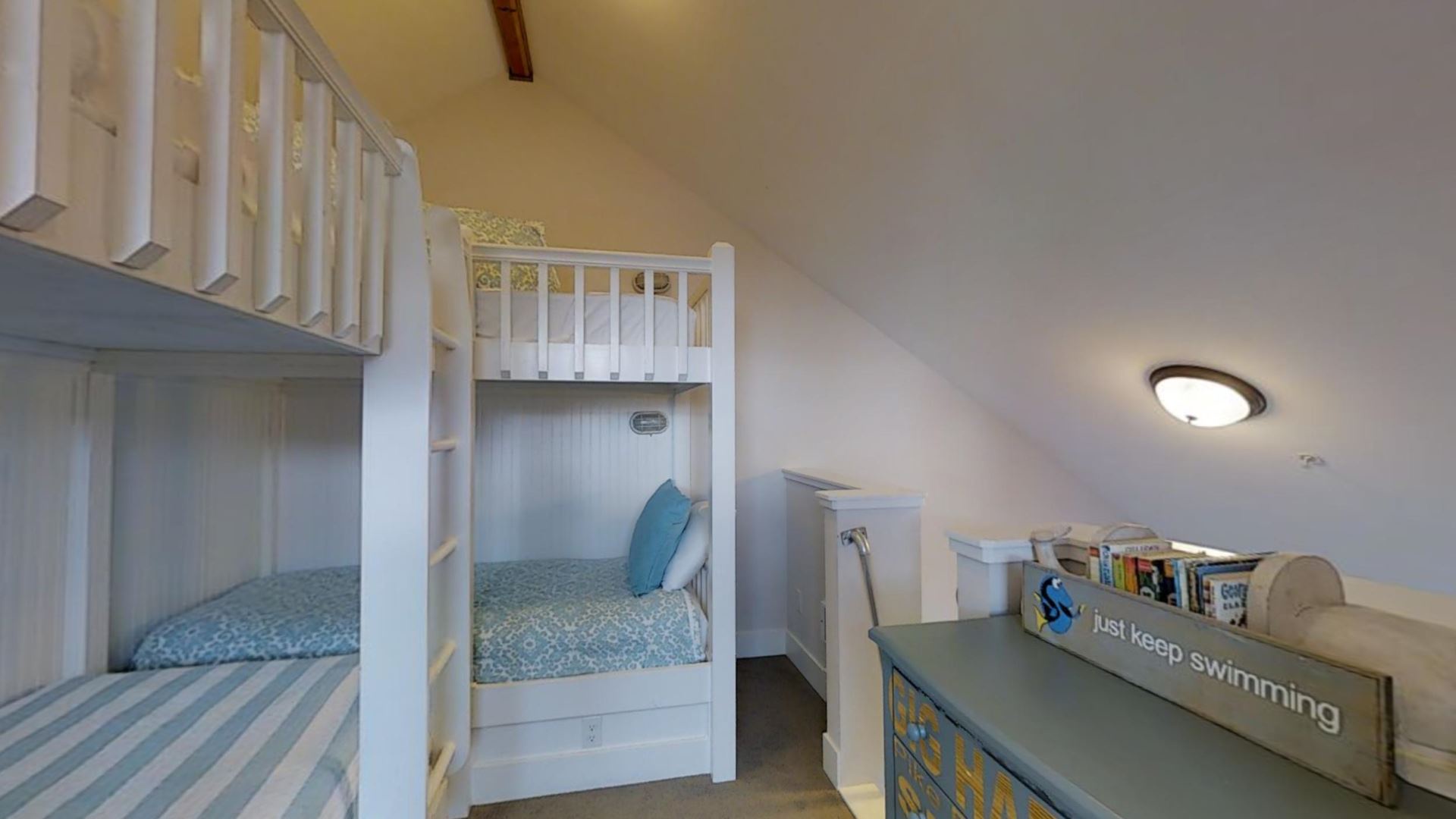 Loft, accessible by ladder, is the highest level in this glorious townhouse, addition to the bunk beds