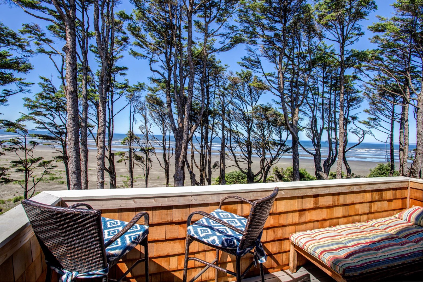 King primary private deck with ocean view and seating
