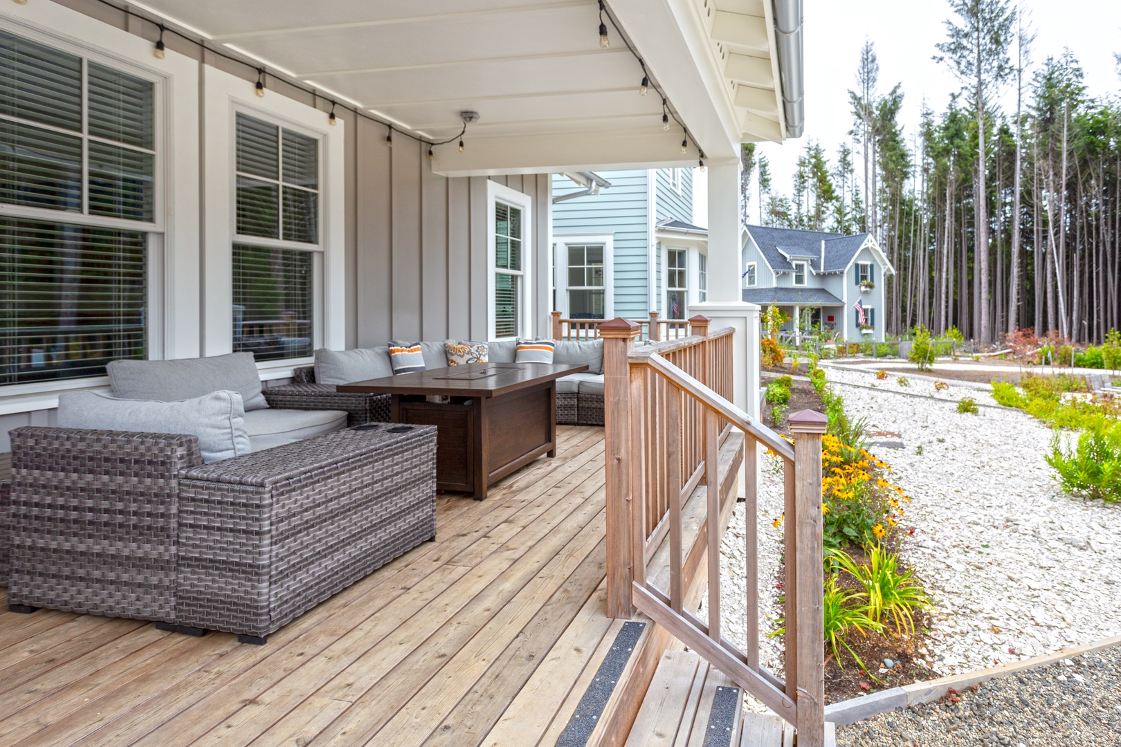 Outdoor seating and grill on porch	
