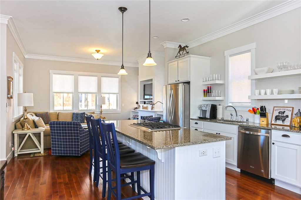 The kitchen is perfect for foodies alike with upgraded, stainless appliances