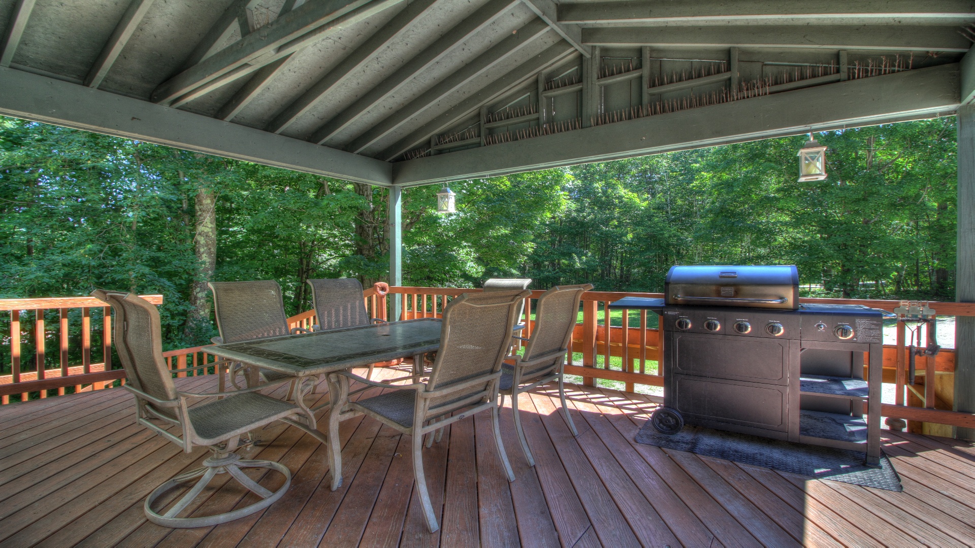 Deck with table, chairs and grill