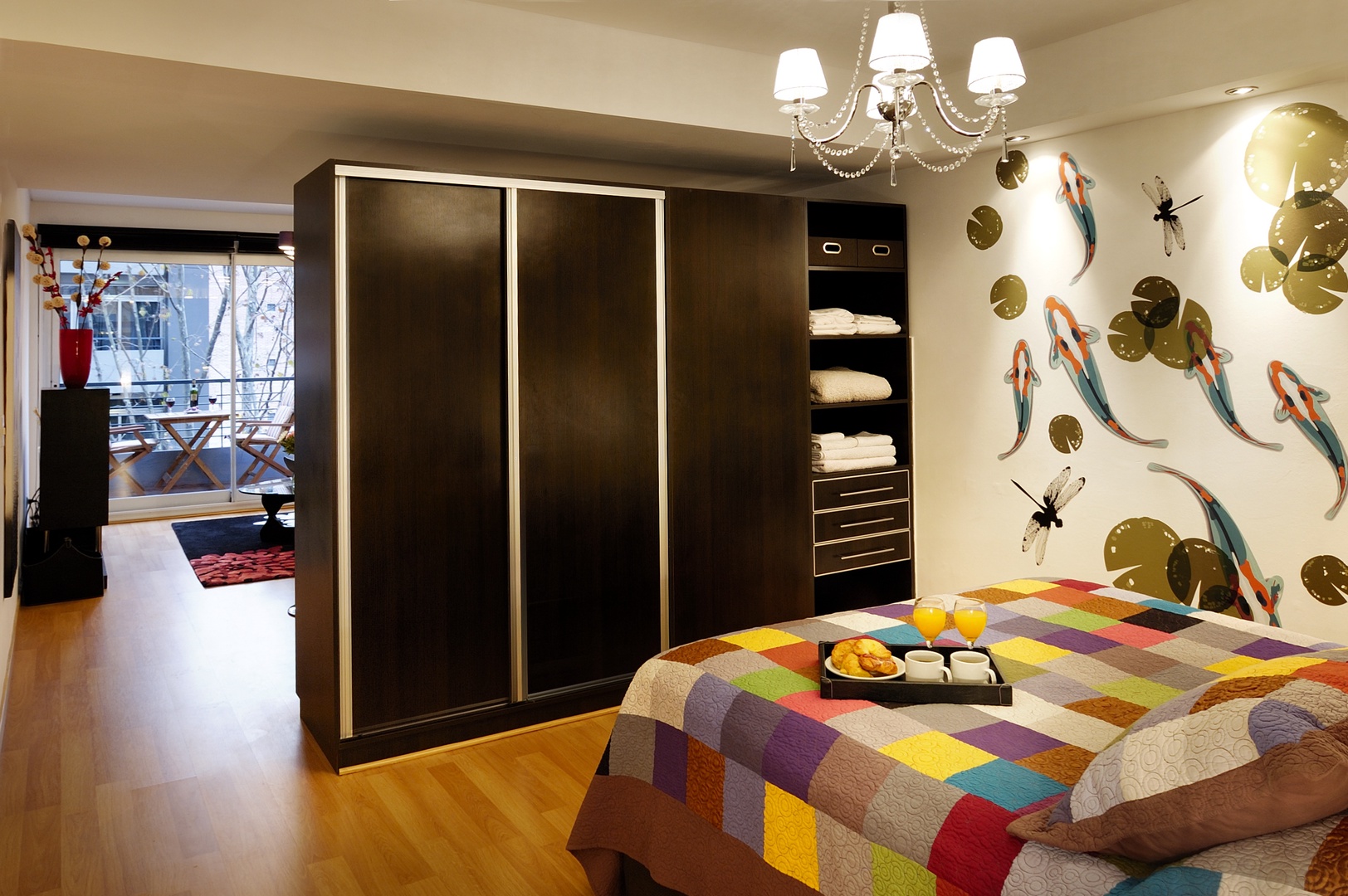 Luxurious open bedroom with plenty of storage space