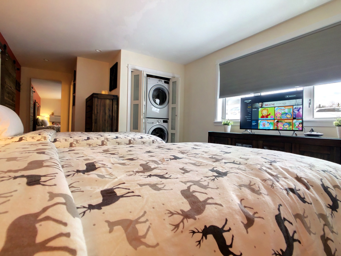 Primary bedroom with washer/dryer