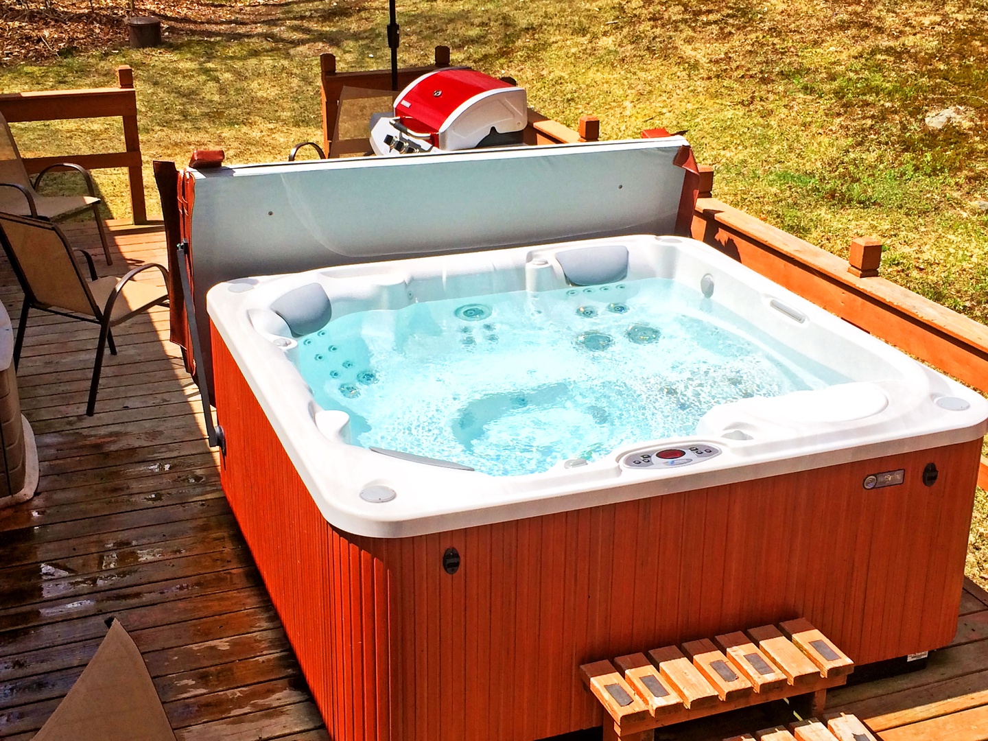 Hot tub and grill on back deck