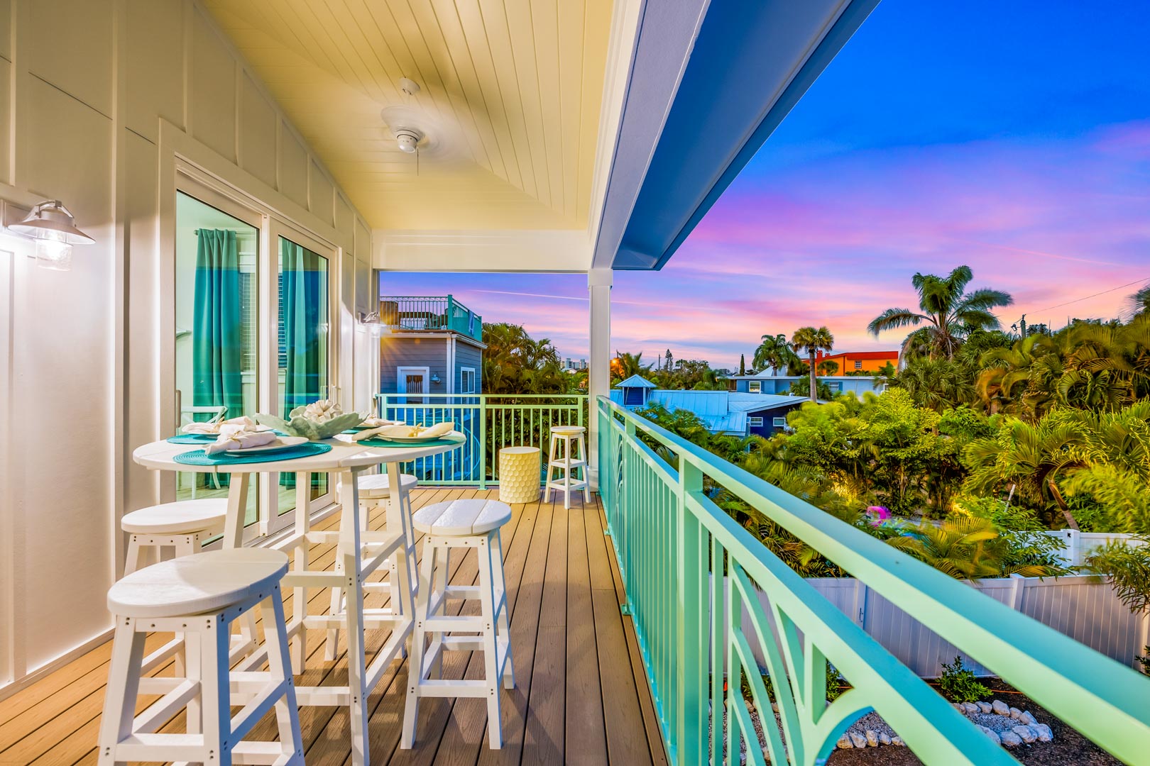 Balcony View of the Pool and Siesta Key Village at Sunset